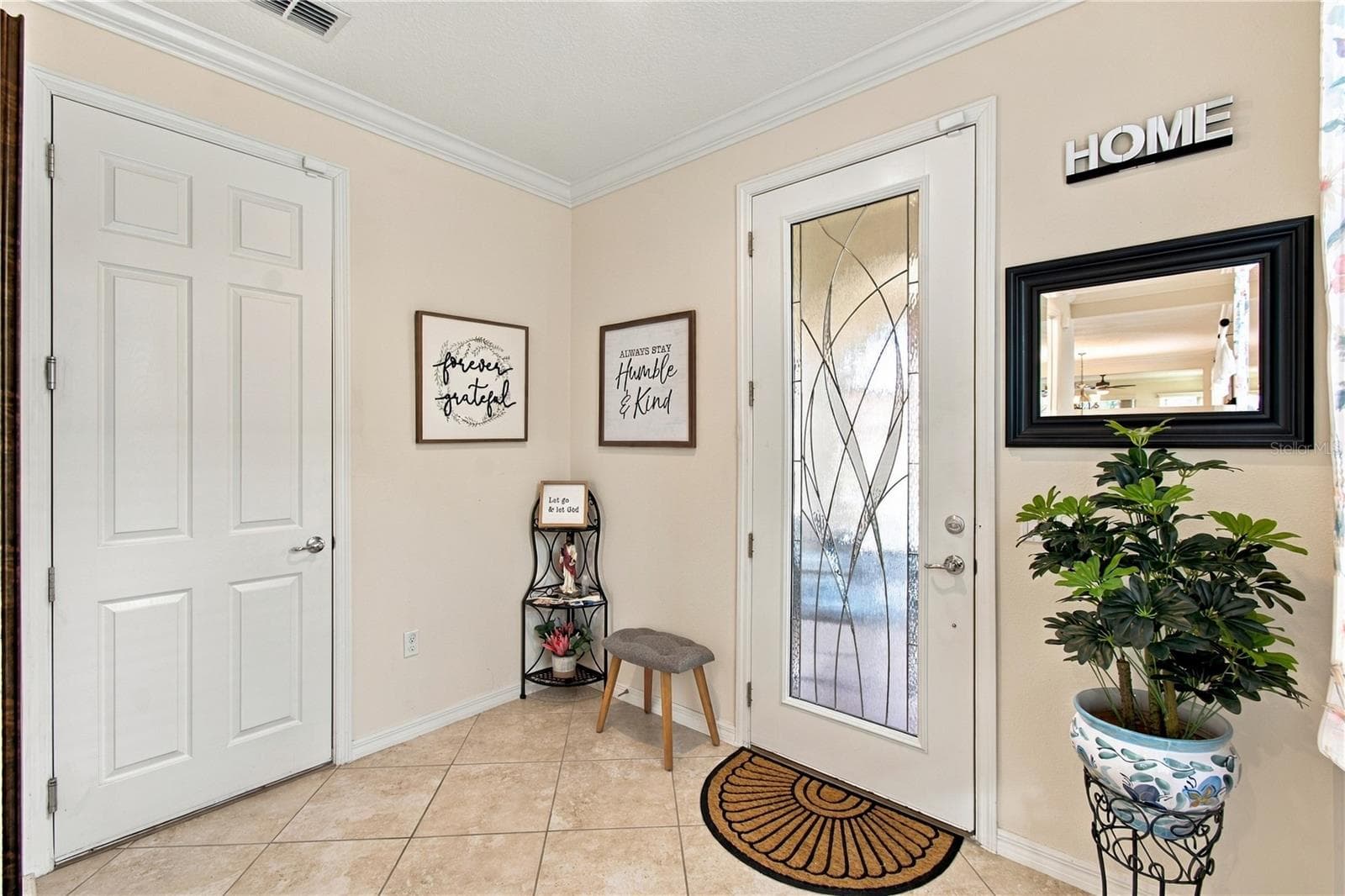 LEADED GLASS DOOR AT FRONT ENTRY - 814 SHADY CANYON WAY, POINCIANA