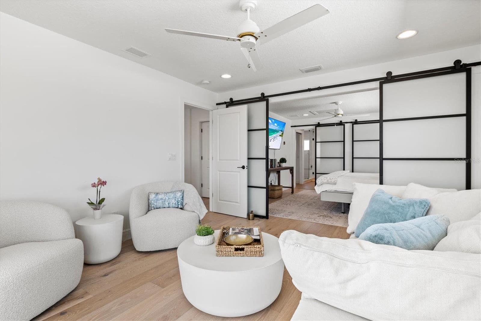Primary suite sitting room with views of the river. - 1914 RIVERSIDE DR E, BRADENTON