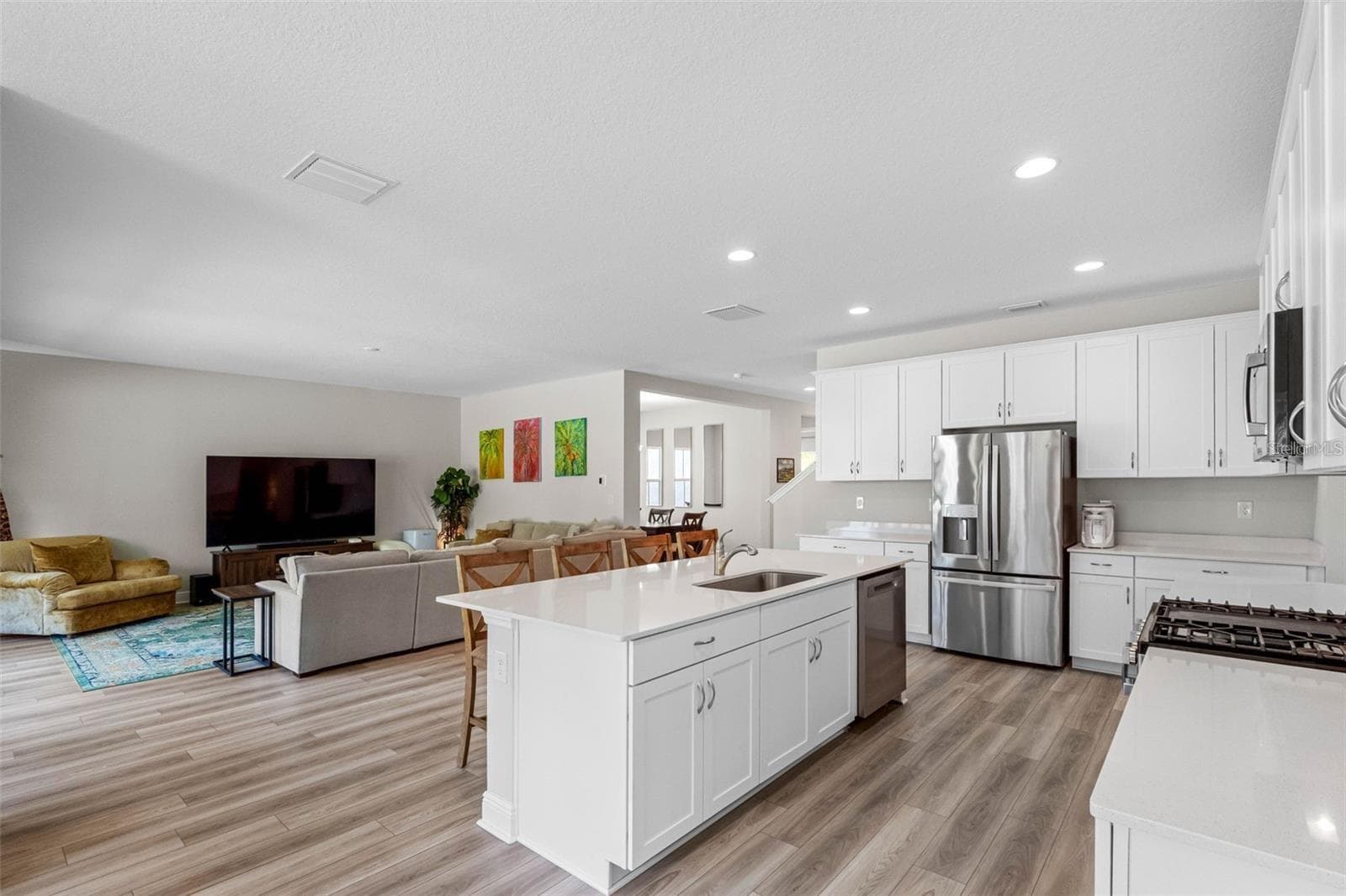 Open floor plan connecting the kitchen and great room - 14868 SUMMER BRANCH DR, LITHIA