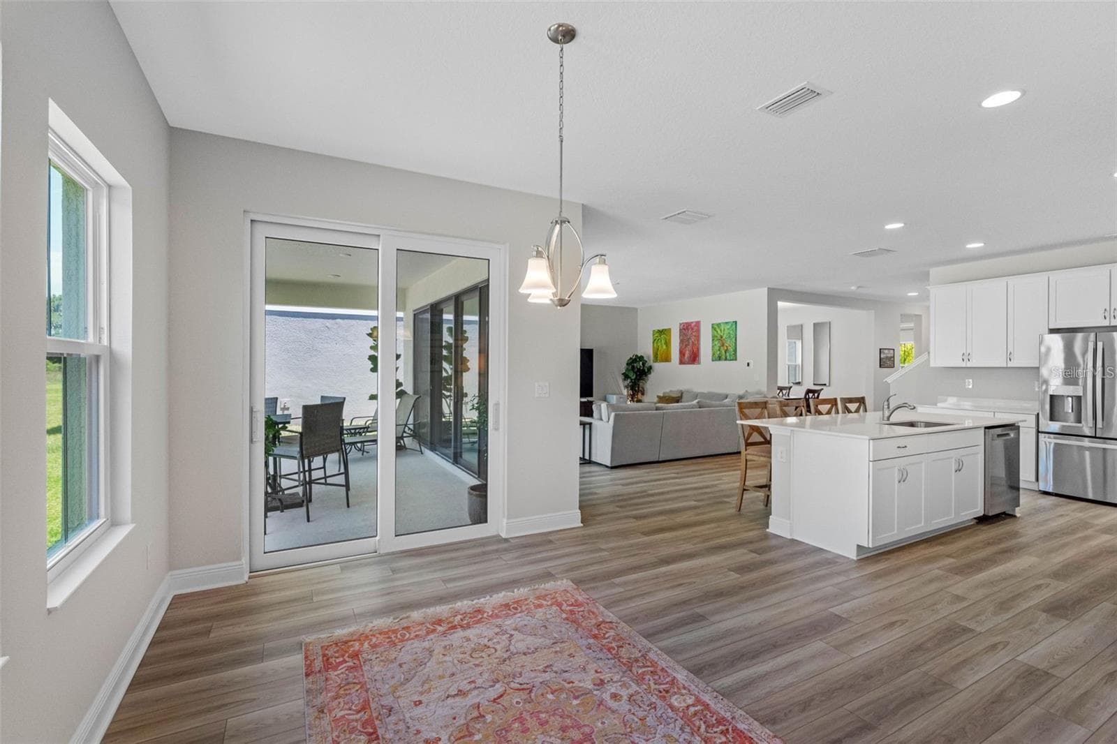 Sunlit cafe with sliding glass doors to the lanai - 14868 SUMMER BRANCH DR, LITHIA