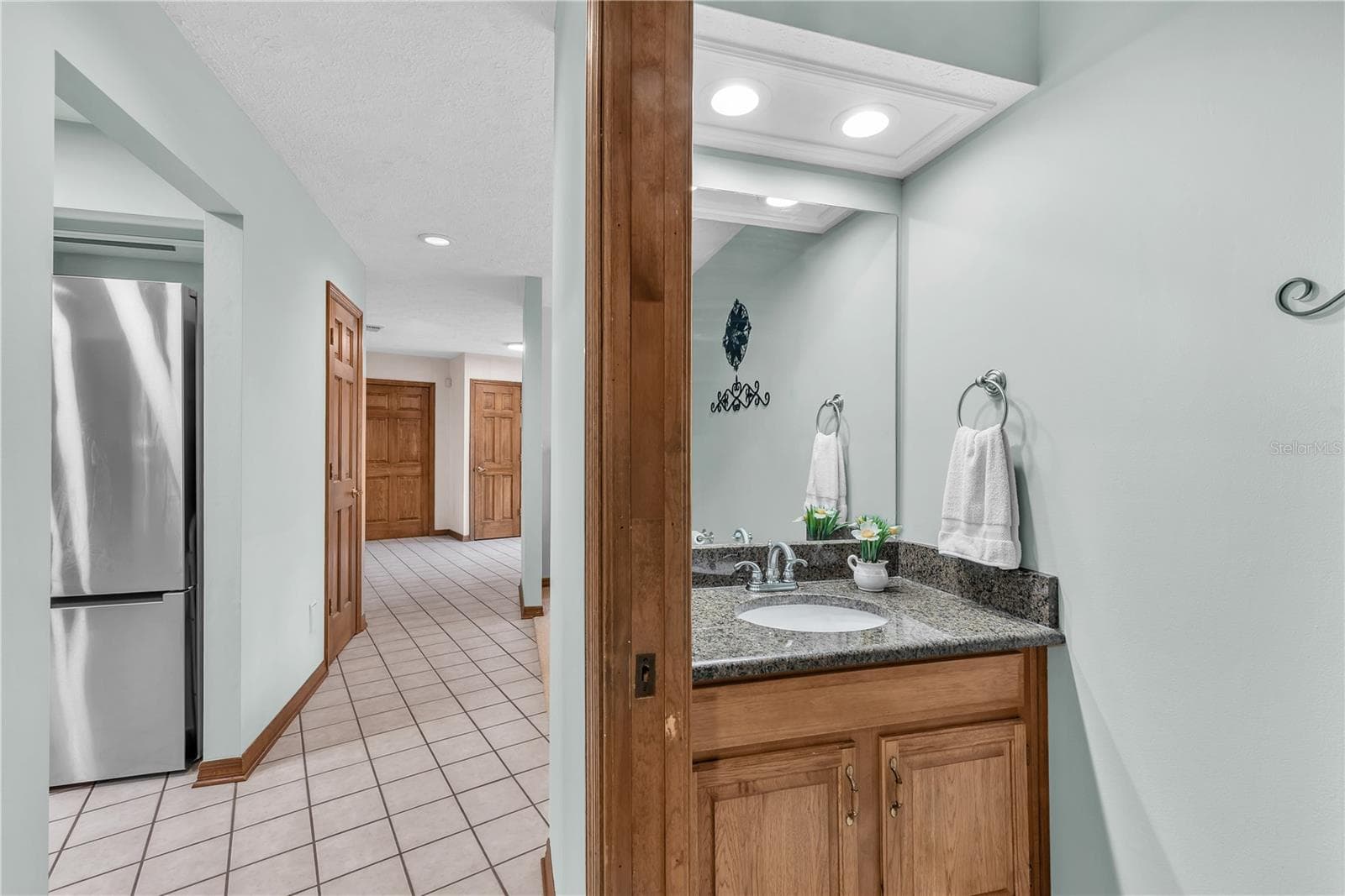 There is also a convenient Powder bath for guests. - 2421 OAK LANDING DR, BRANDON