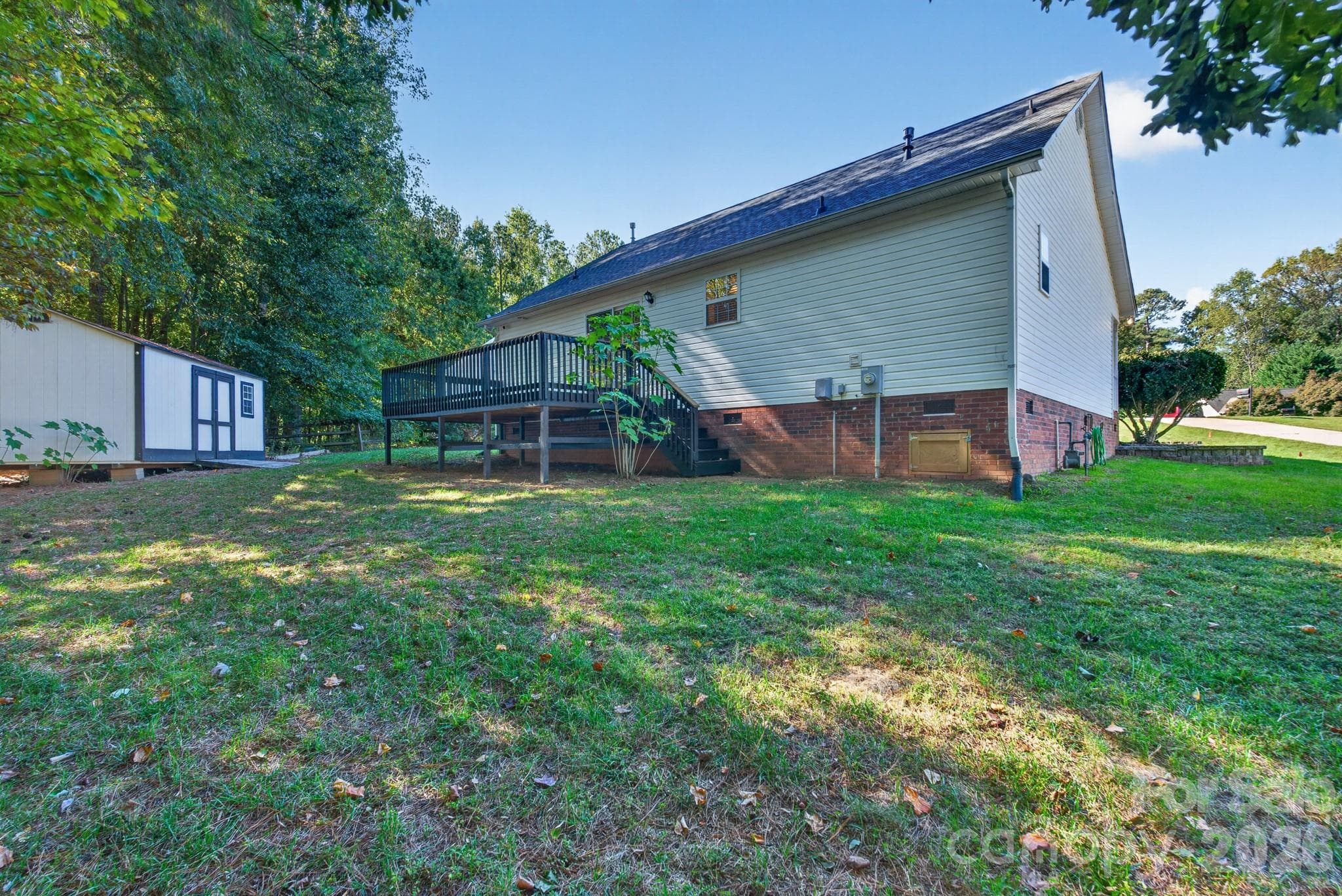 Usable backyard space perfect for pets, play, or outdoor gardening projects. - 702 Painted Lady Court, Rock Hill