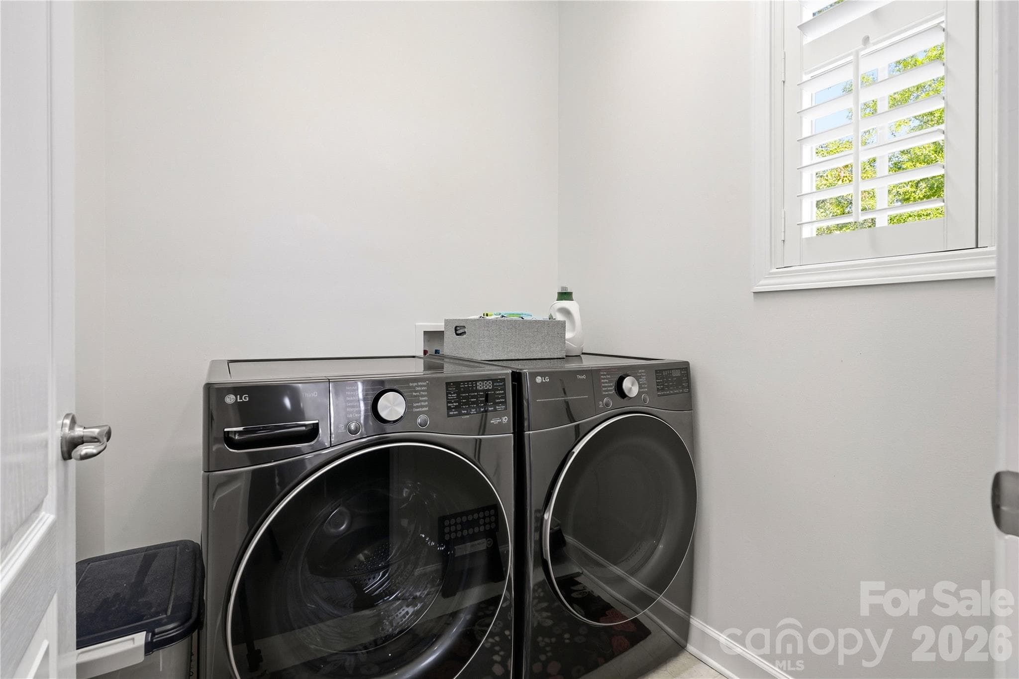 Separate laundry room off the kitchen - 16918 Summers Walk Boulevard, Davidson
