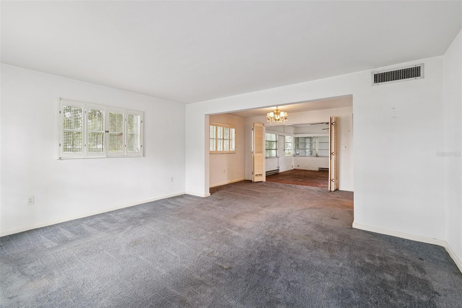 The formal living room is located at the front of the home - 803 HILLSIDE AVE, LAKE WALES