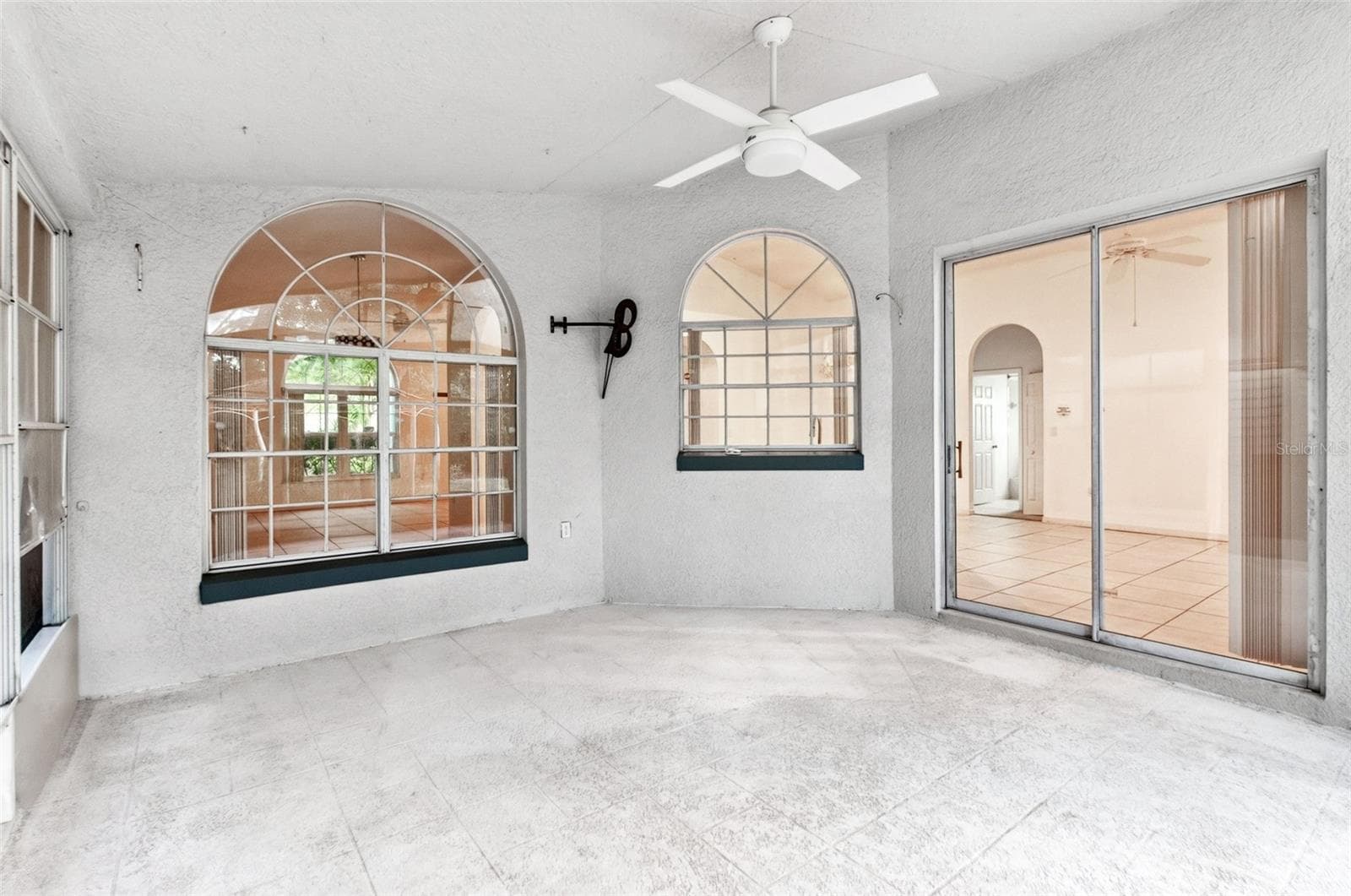 Lanai ~ Dining Room, Kitchen & Family Room View - 168 PINE LAKE VIEW DR, DAVENPORT