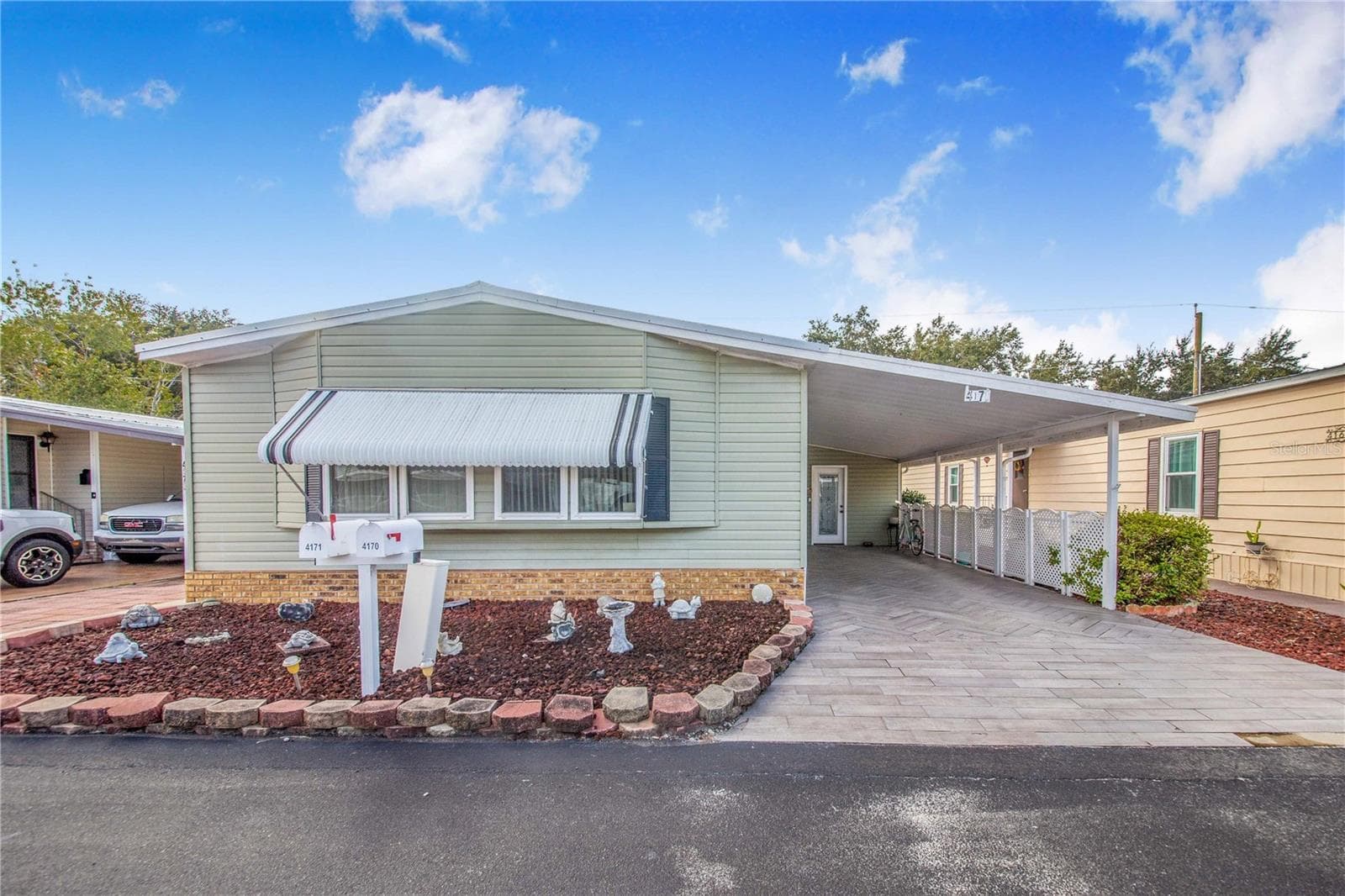 Manufactured Home at 4171 ROLLING OAKS DR, WINTER HAVEN, photo 2 of 43