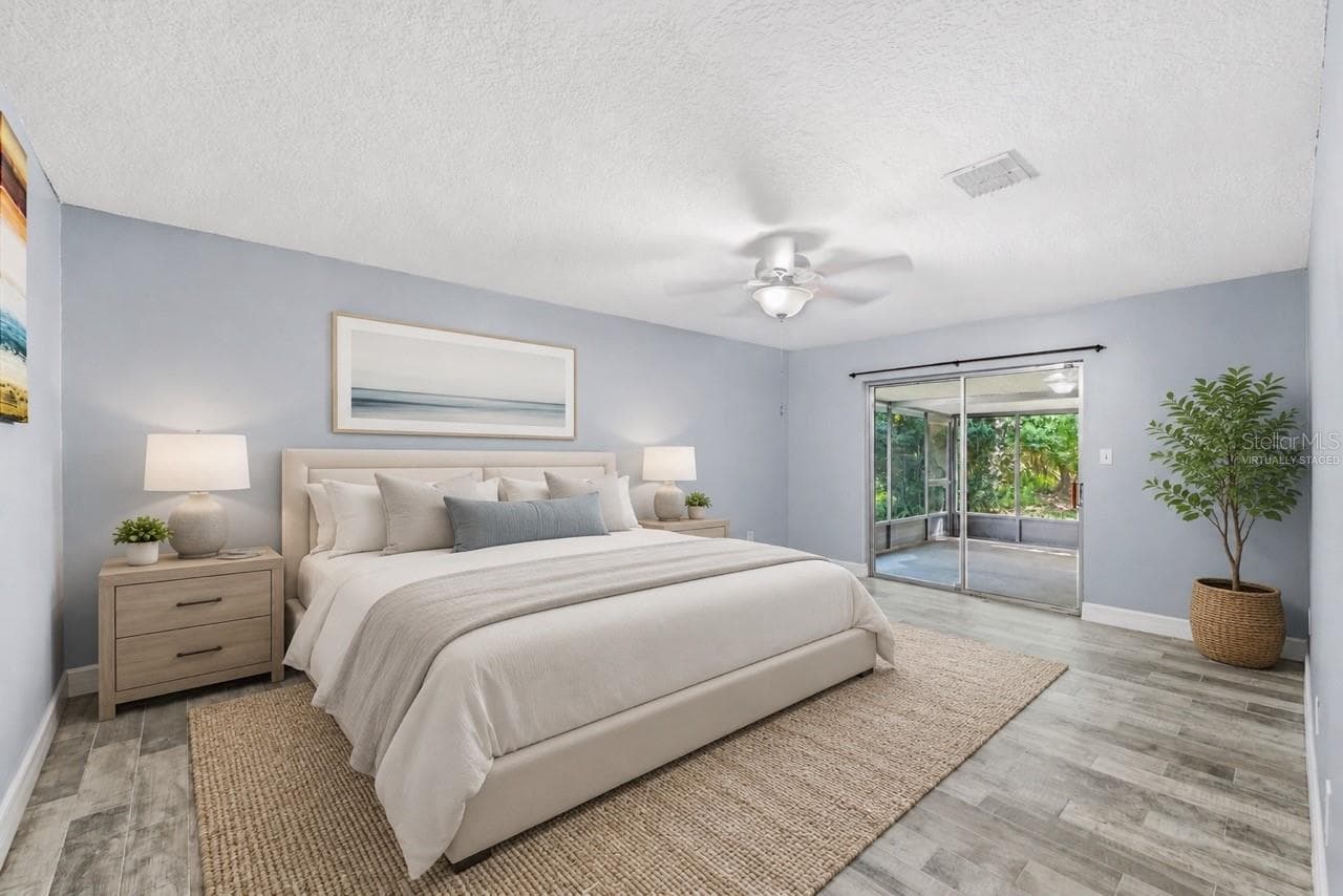 Primary suite. Virtually Staged furniture - 10702 WILLIAM TELL DR, ORLANDO