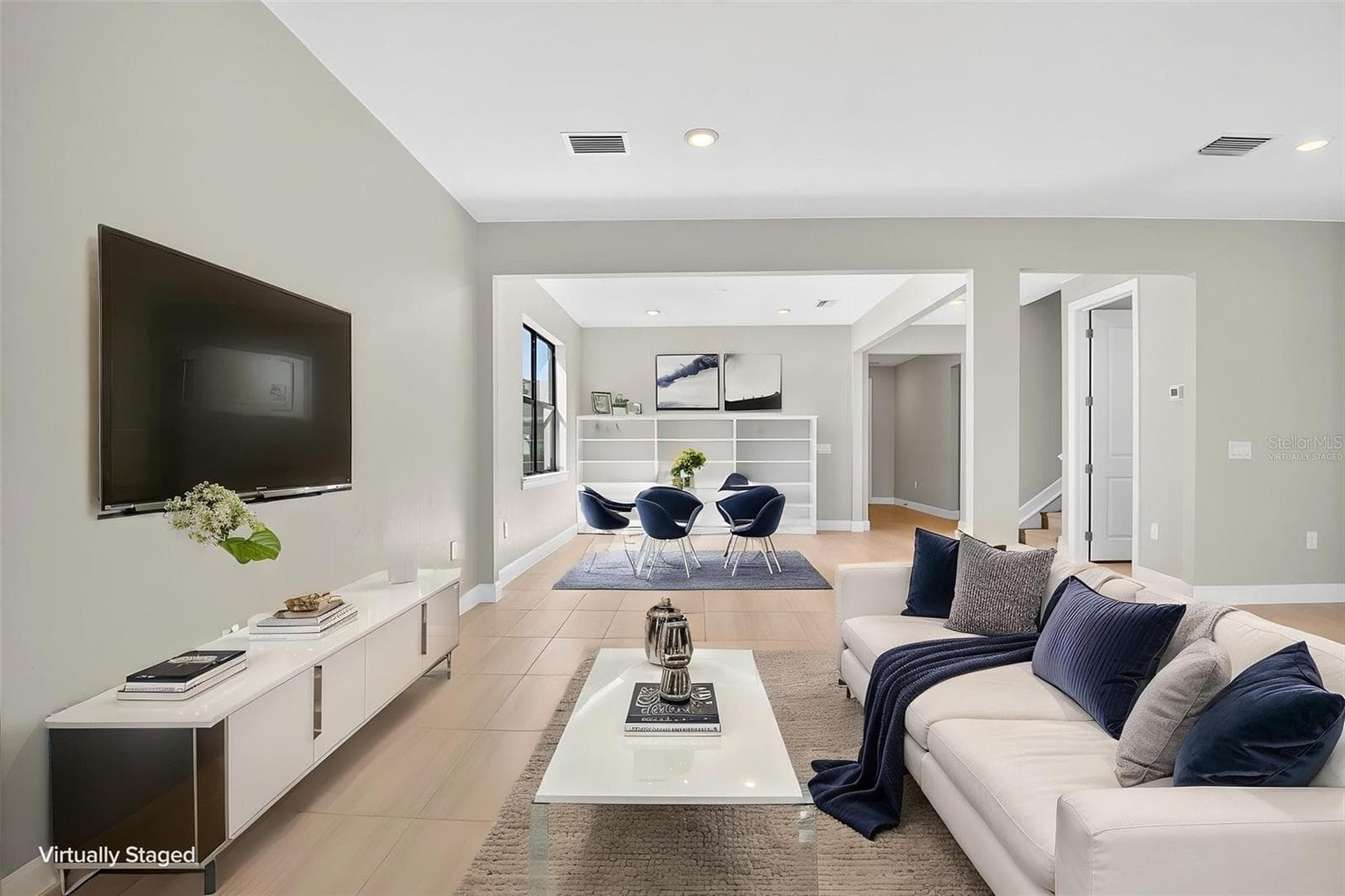First floor family room virtually staged - 16320 HIDDEN OAK LOOP, BRADENTON