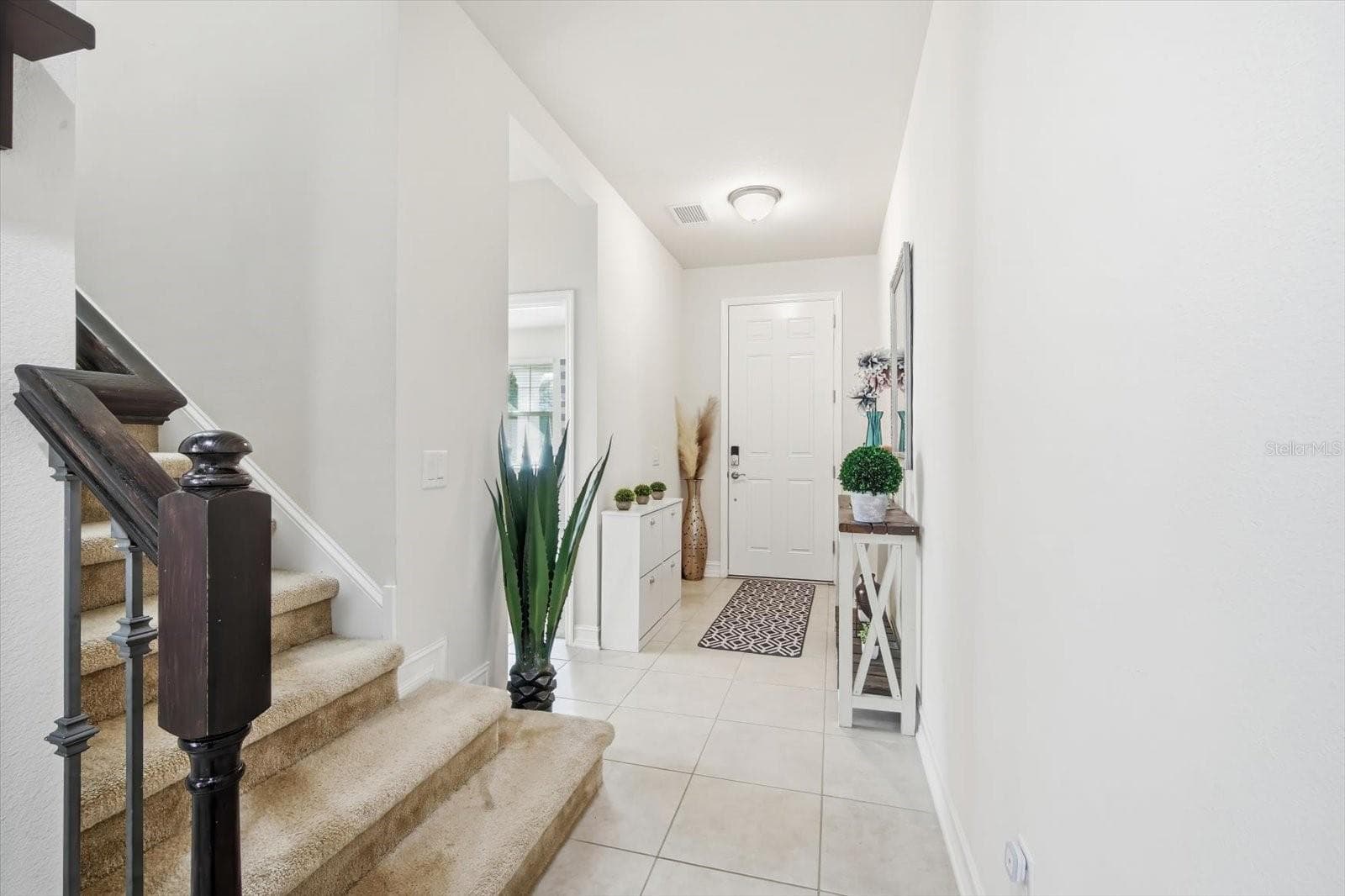 Foyer to Staircase - 13821 FAIRWAY BUNKER DR, TAMPA