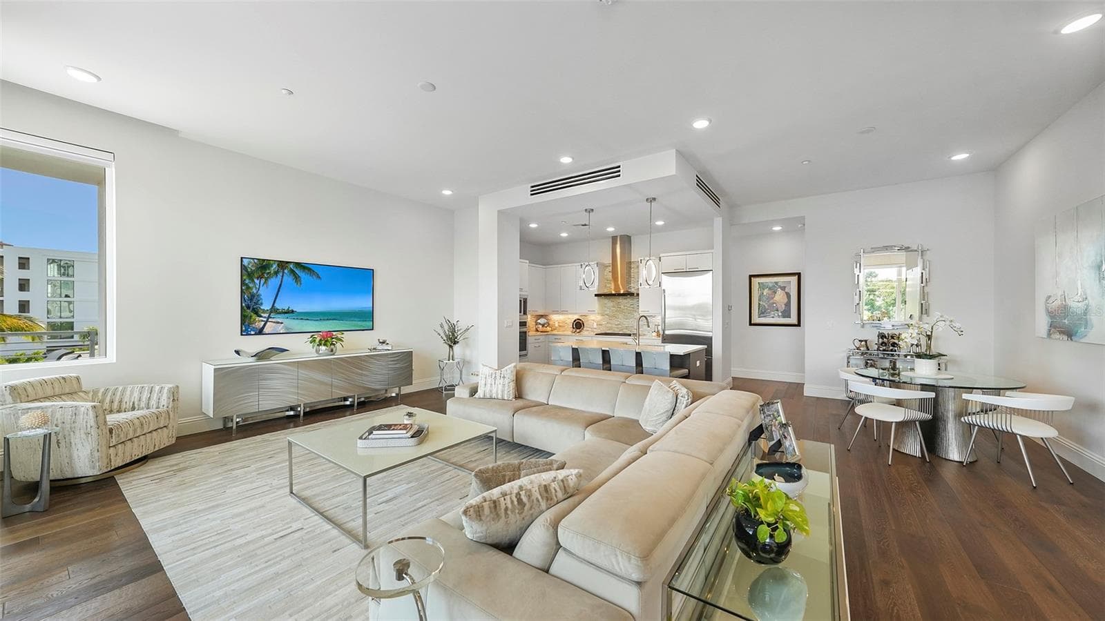 Photo of living area looking into the kitchen area previously furnished - 609 GOLDEN GATE PT #301, SARASOTA