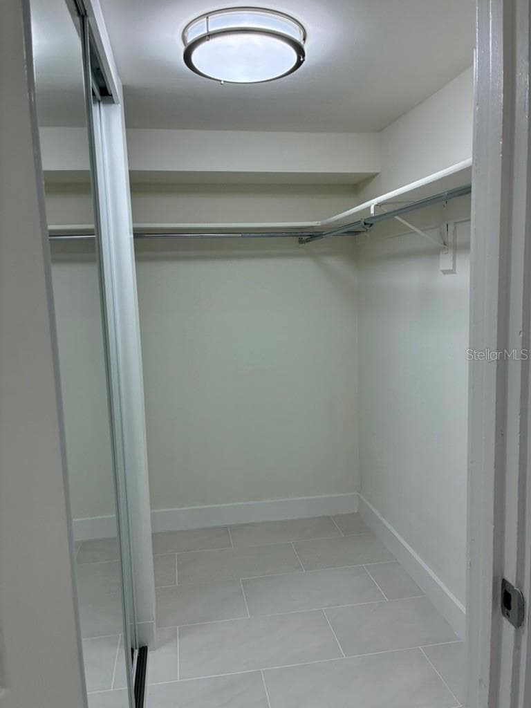 Master walk-in closet - 5999 VILLAGE CIR #990, ORLANDO