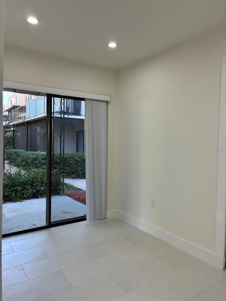 Rear porch from 2nd bedroom - 5999 VILLAGE CIR #990, ORLANDO