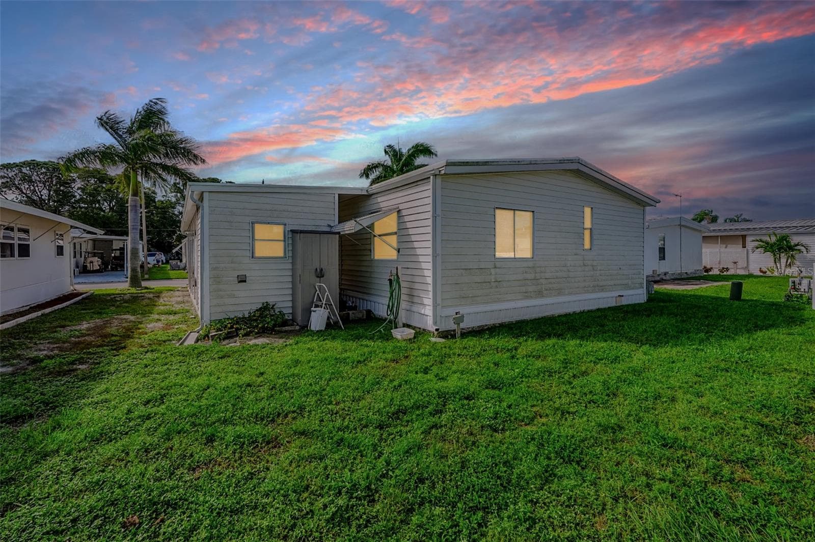 Manufactured Home at 82306 1ST AVE N #306, PINELLAS PARK, photo 2 of 40