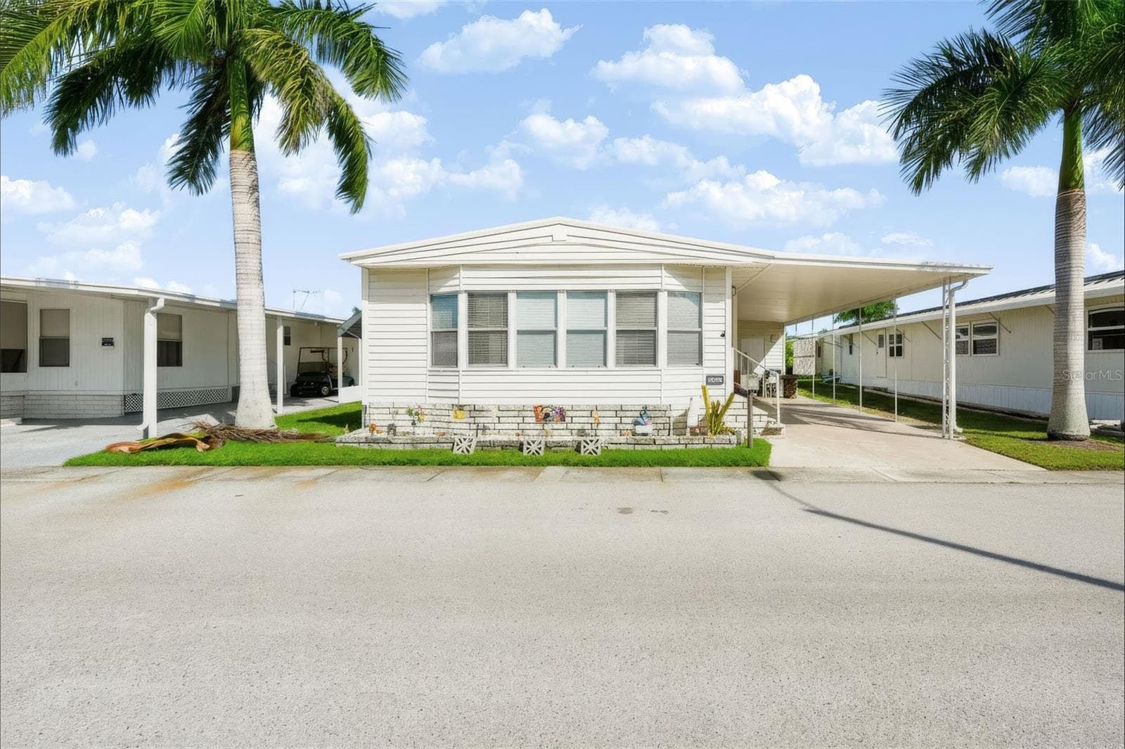 Manufactured Home at 82306 1ST AVE N #306, PINELLAS PARK, photo 4 of 40