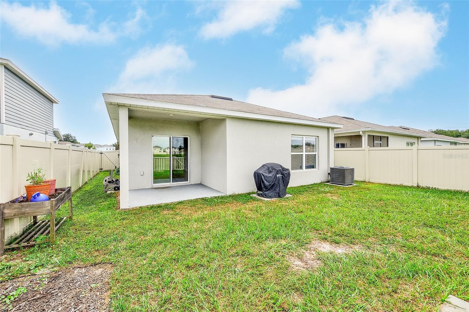 BACK EXTERIOR - 35235 GENDRY ST, ZEPHYRHILLS