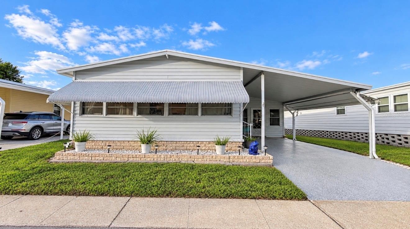 Manufactured Home at 1100 BELCHER RD S #713, LARGO, photo 3 of 34