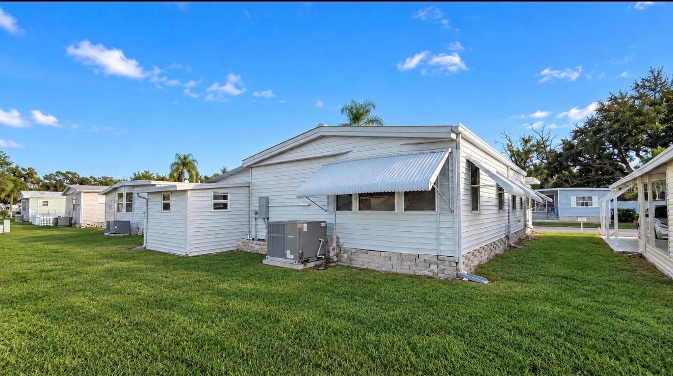 Manufactured Home at 1100 BELCHER RD S #713, LARGO, photo 4 of 34