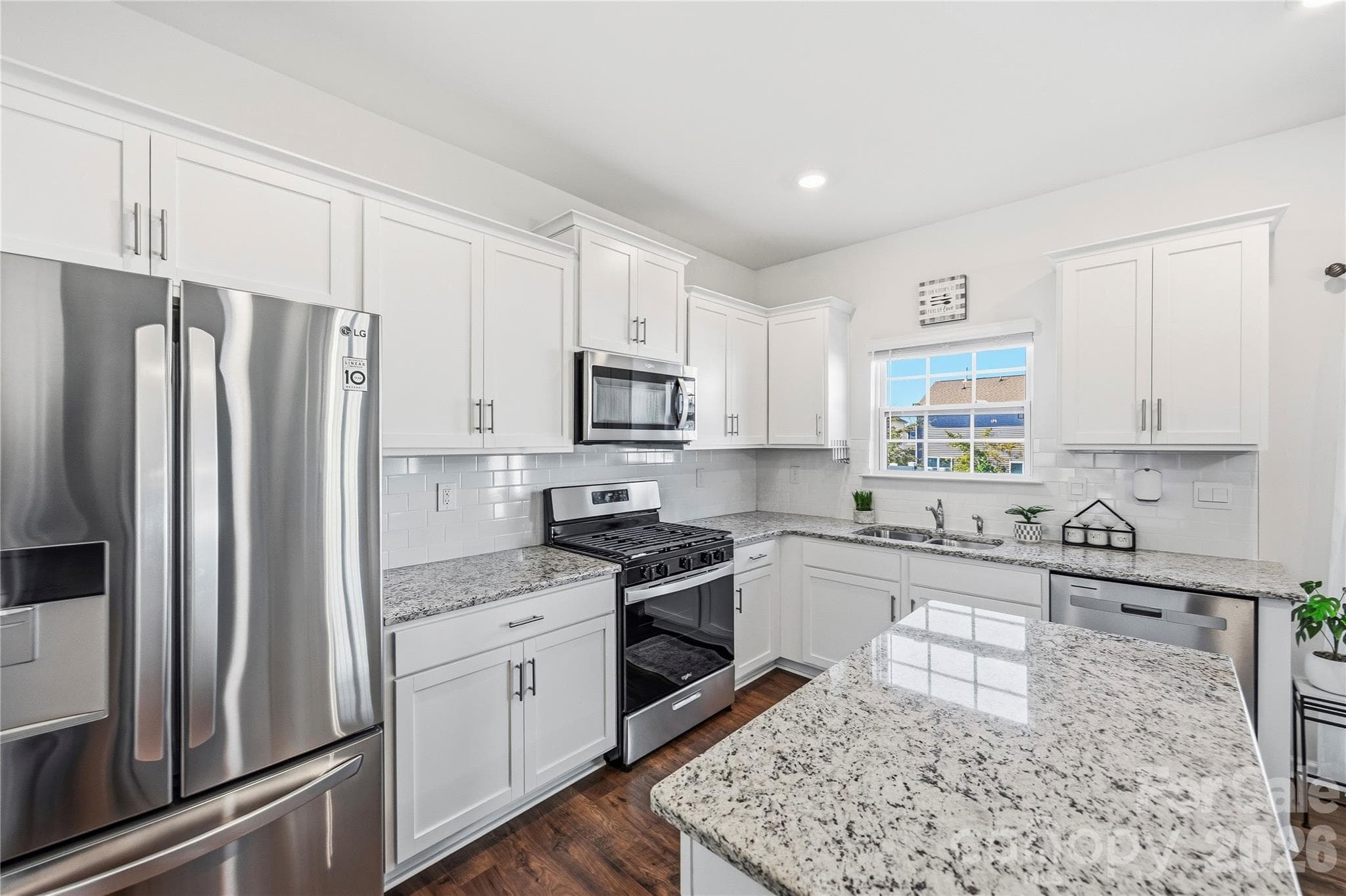 Open floor plan with plenty of counter space and storage. - 9022 Poquoson Drive, Gastonia