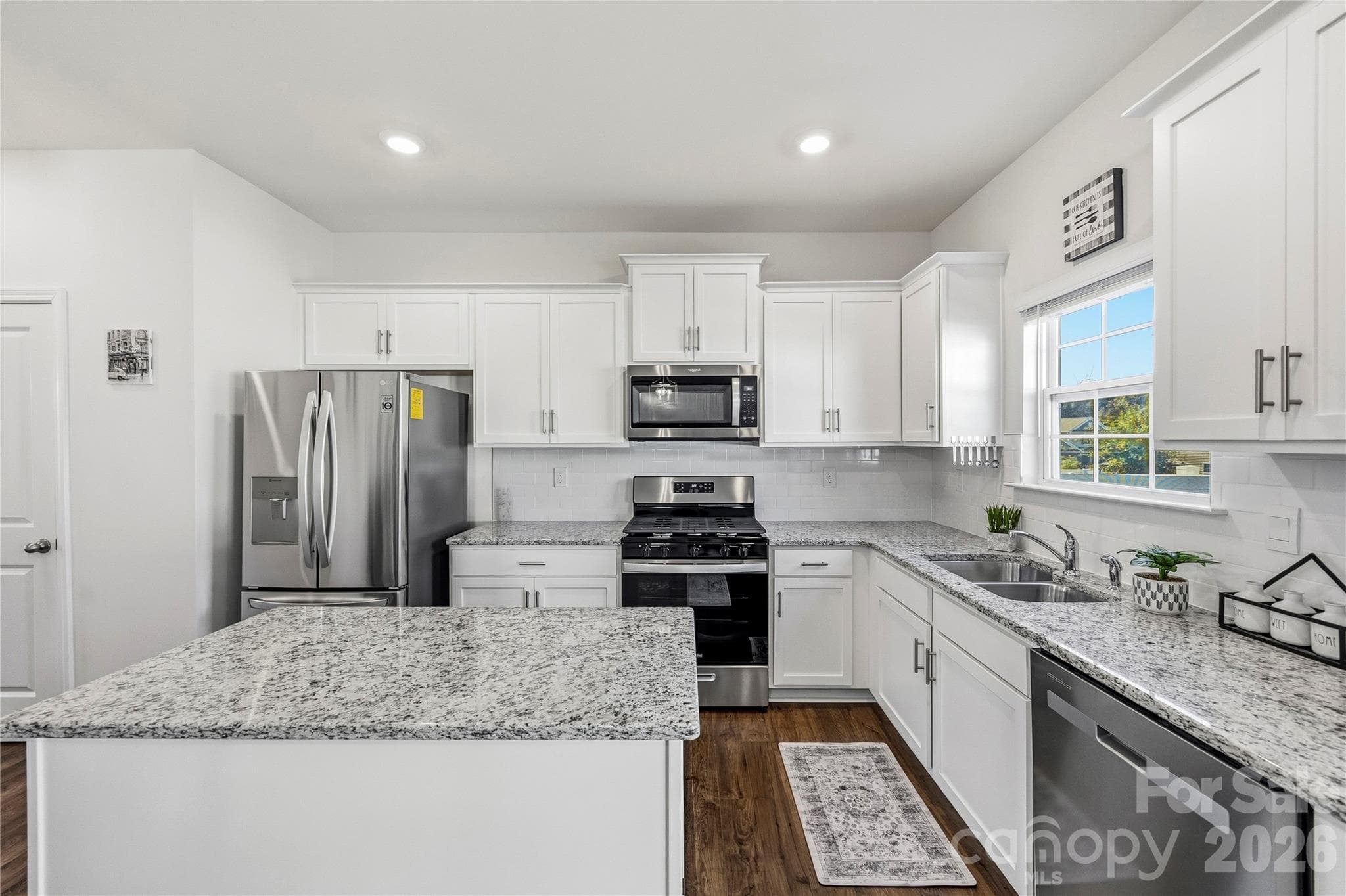 Open floor plan with plenty of counter space and storage. - 9022 Poquoson Drive, Gastonia