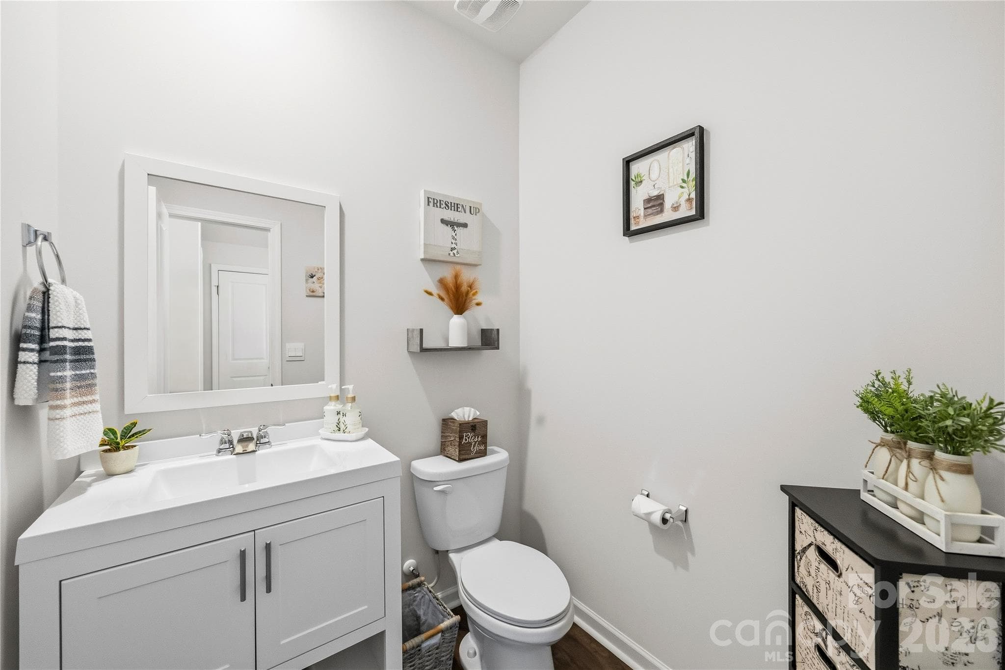 Main level powder room. - 9022 Poquoson Drive, Gastonia