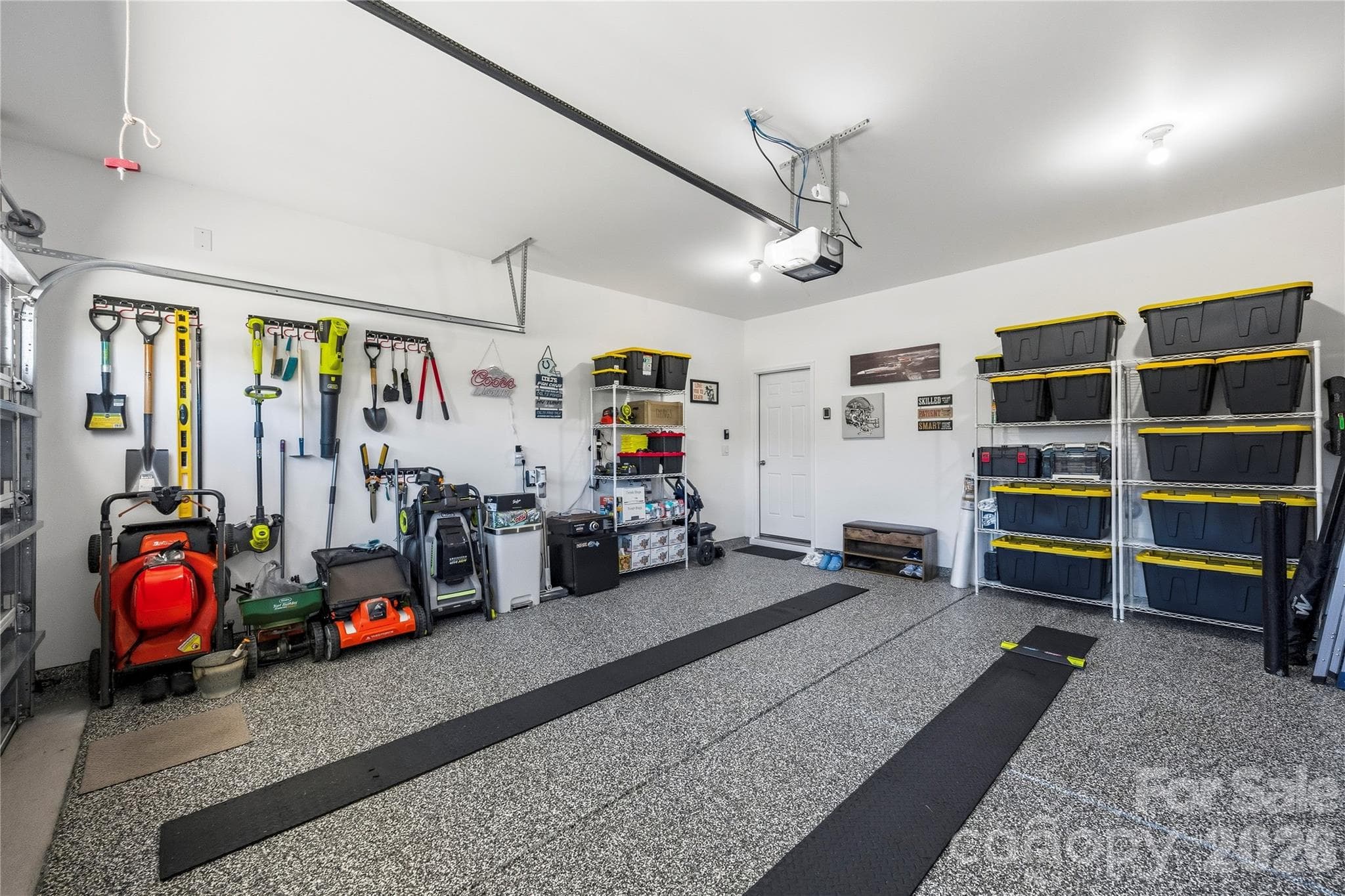 Epoxy coated garage flooring. - 9022 Poquoson Drive, Gastonia