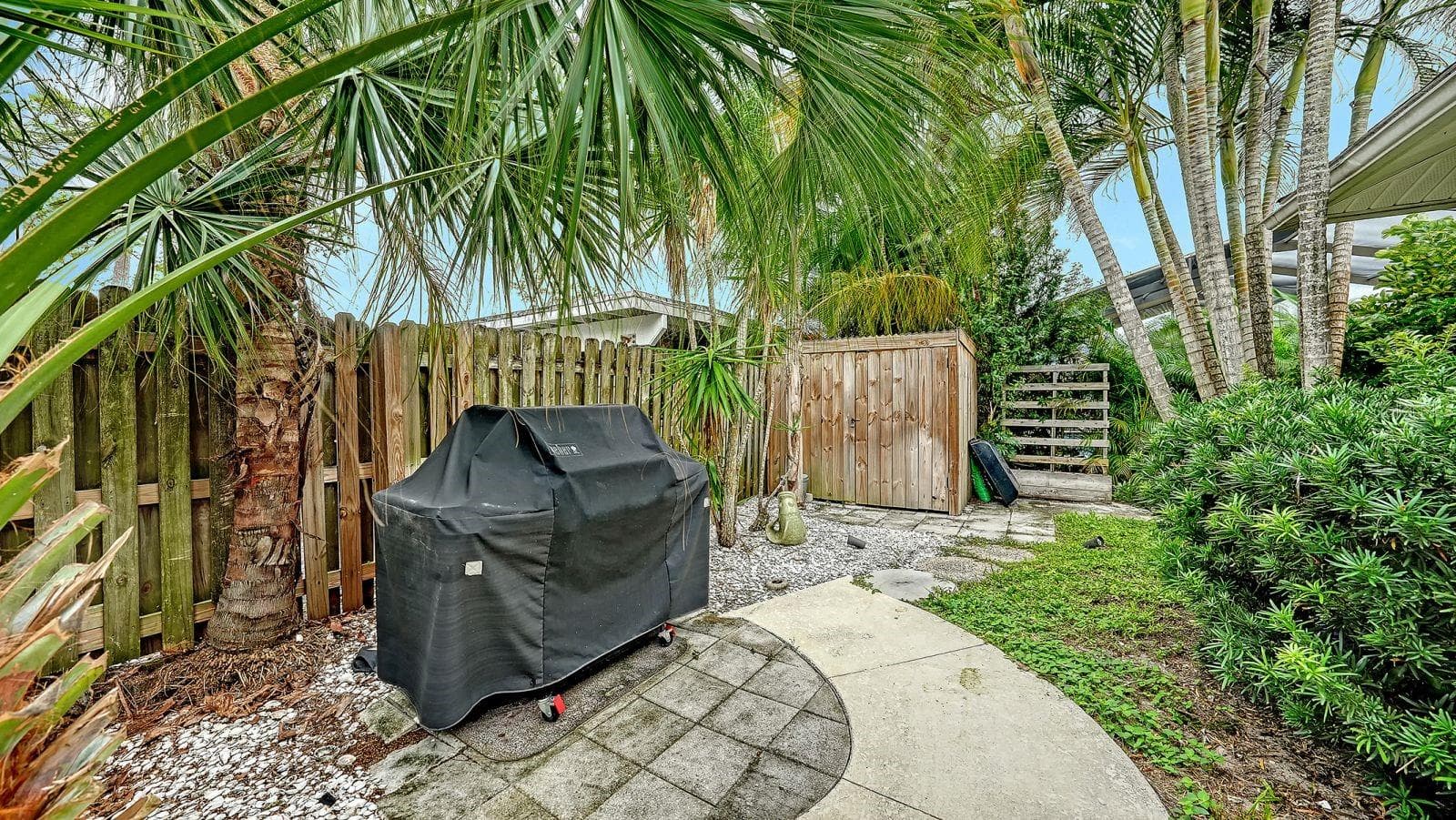 Privacy Fence, Outdoor Grilling Area & a Storage Shed for extra storage and convenience. - 2295 PINE VIEW CIR, SARASOTA