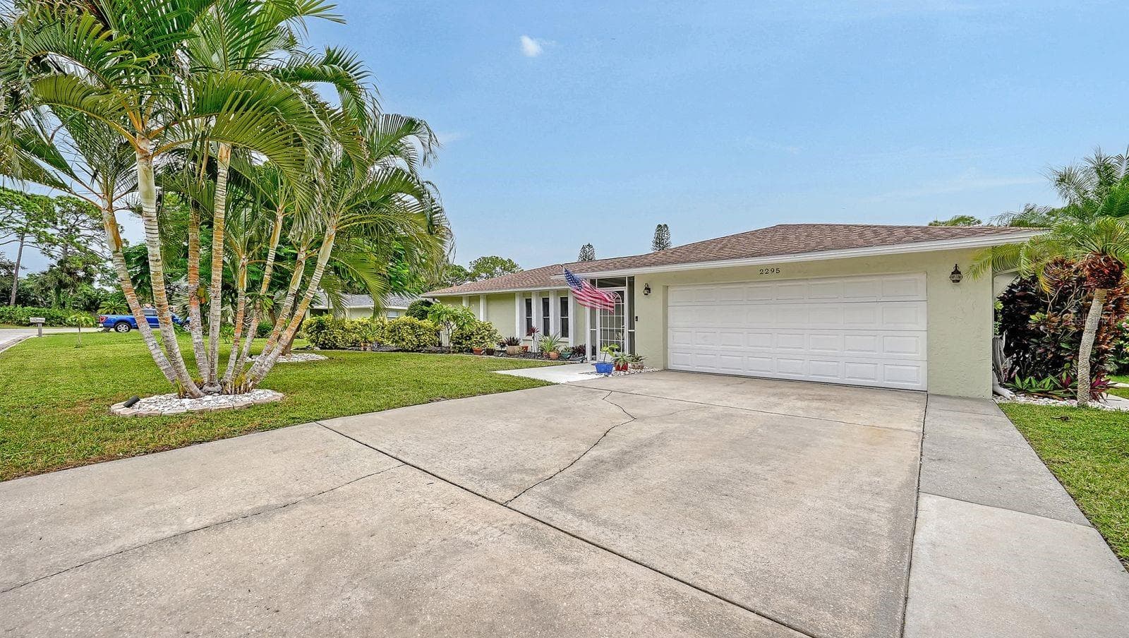 2 Car Garage and spacious driveway for extra parking. - 2295 PINE VIEW CIR, SARASOTA
