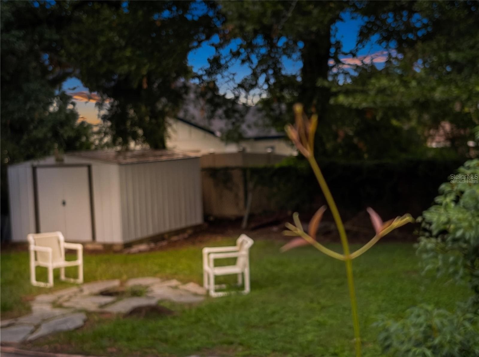 back yard showing shed"Virtually staged" - 1199 KING AVE, LAKELAND