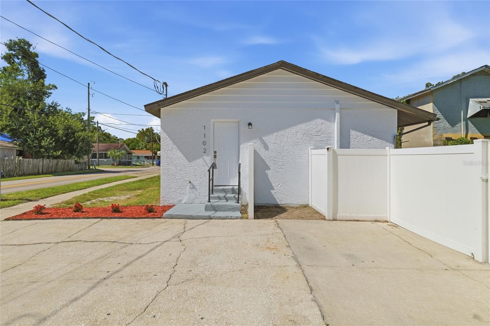 Single Family Residence at 1102 E SITKA ST, TAMPA, photo 3 of 27