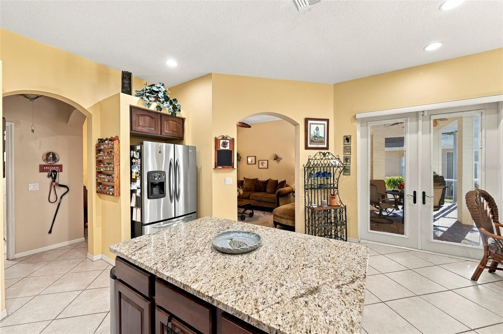 Open concept kitchen - stainless appliances with island - 23442 VISTAMAR CT, LAND O LAKES