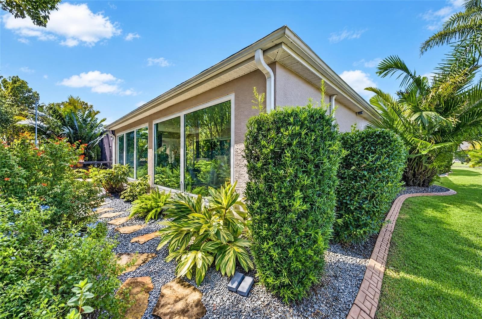 Backyard has lights to feature landscaping and nature preserve. - 3665 VALLEYBROOK WAY, THE VILLAGES