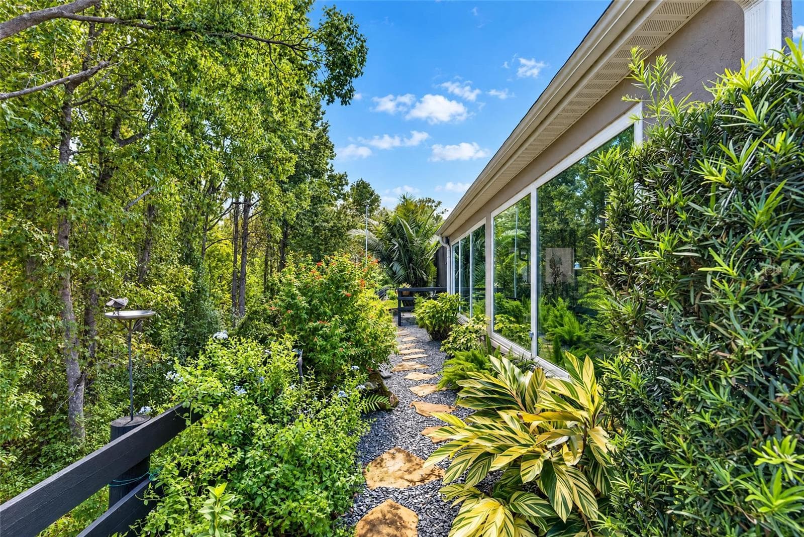 Backyard with walk way. - 3665 VALLEYBROOK WAY, THE VILLAGES