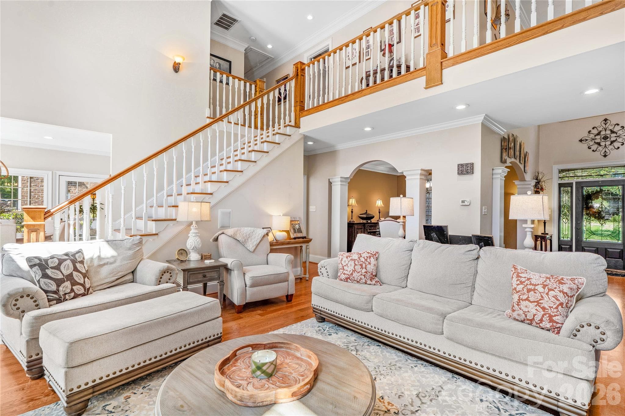 Natural light fills this space and flows into the kitchen, dining and music rooms - 220 Cedar Lake Drive, Statesville