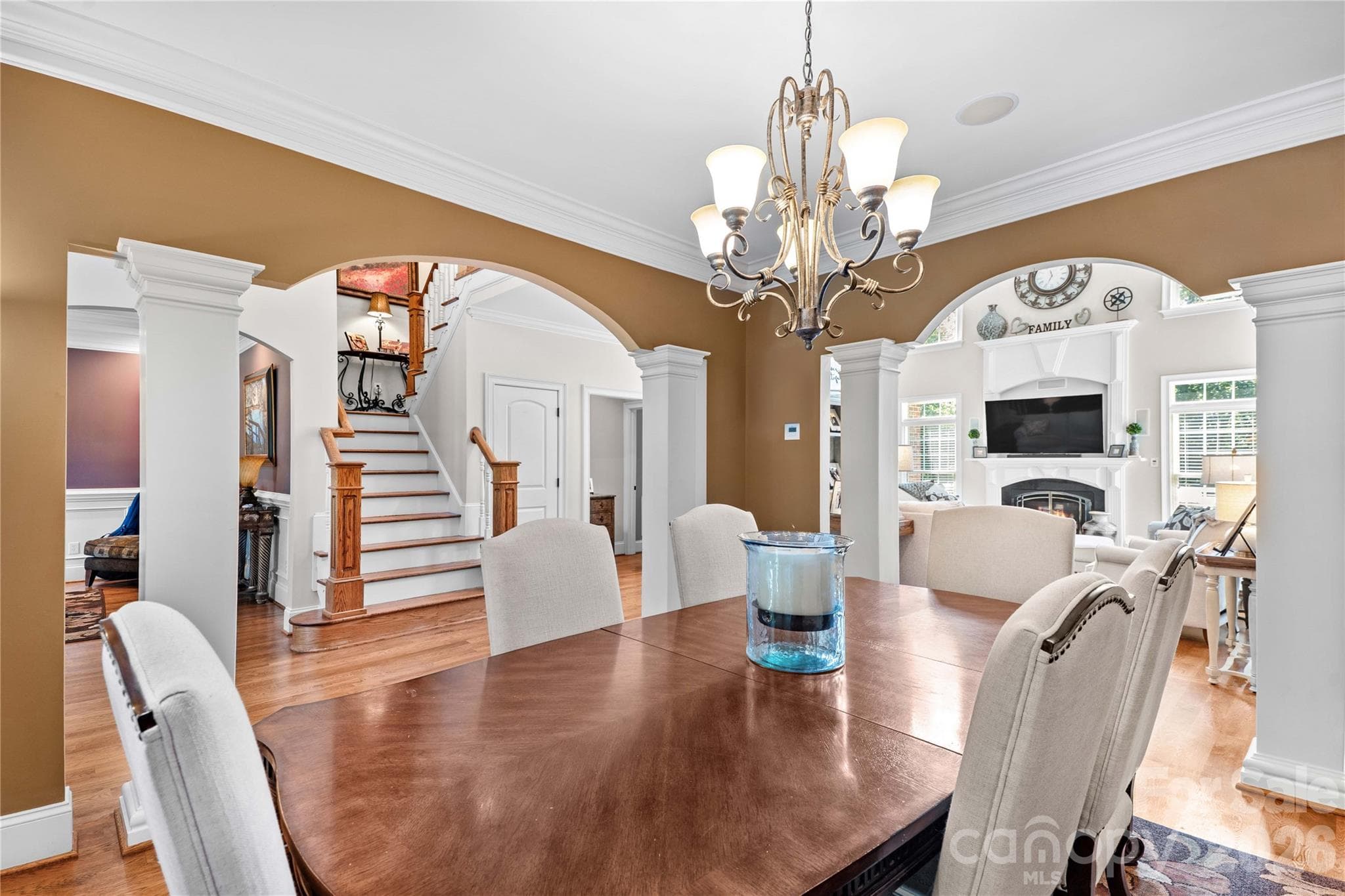 Dining room is open to living area and second staircase - 220 Cedar Lake Drive, Statesville