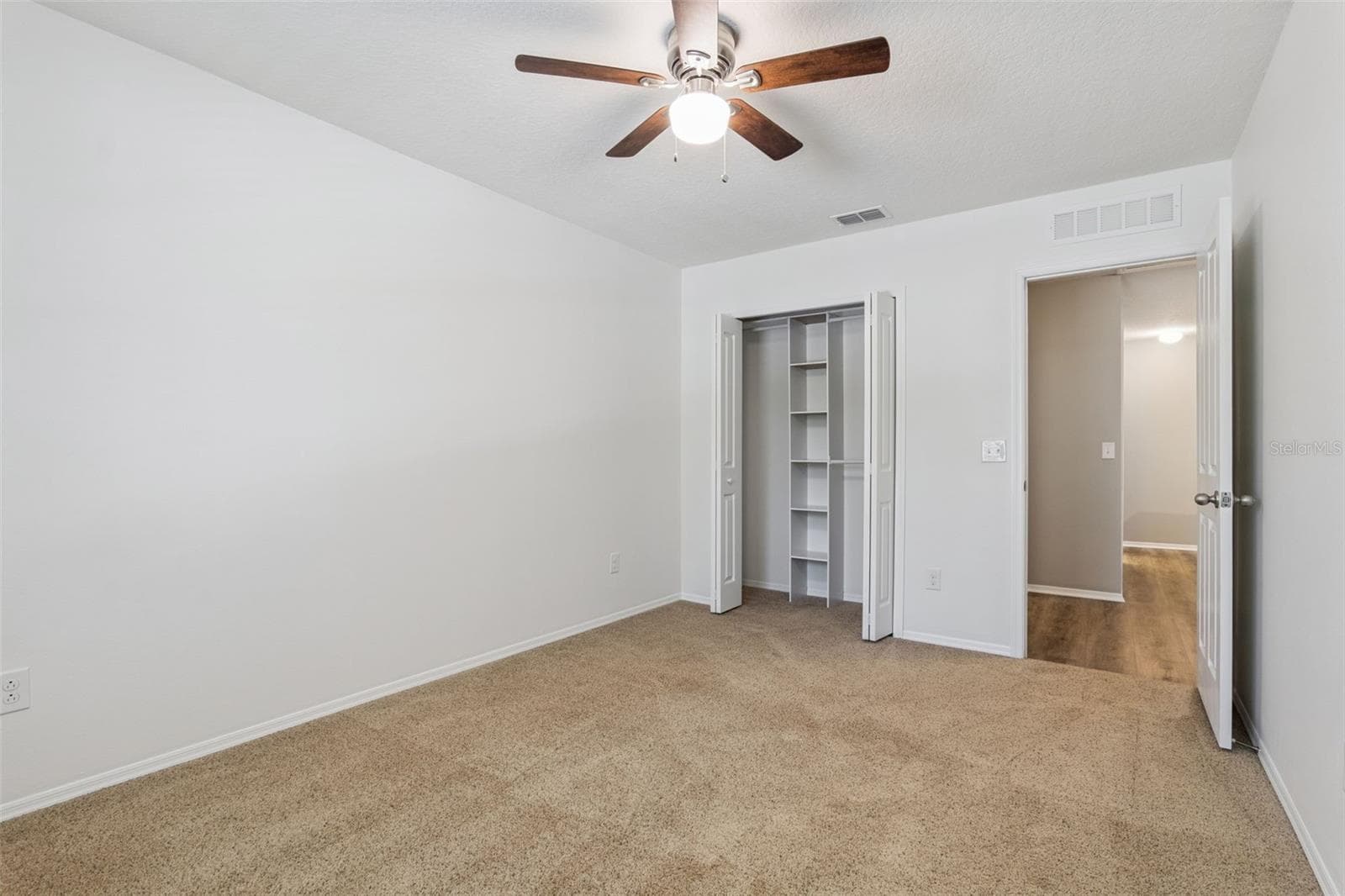 Bedroom 2 (9' x 13') featuring built in closet - 13612 LARANJA ST, CLERMONT