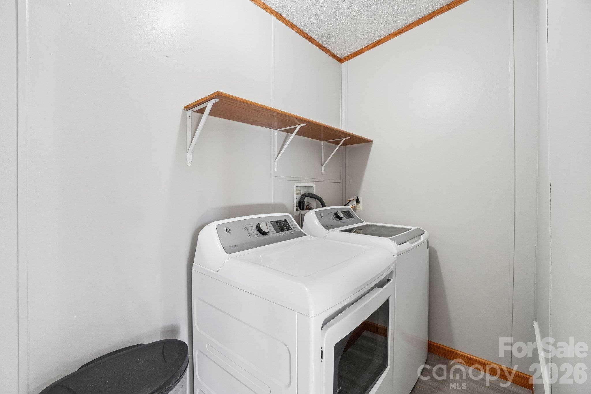 This room accommodates a washer, dryer, and supplies. - 202 Banyan Road, Candler