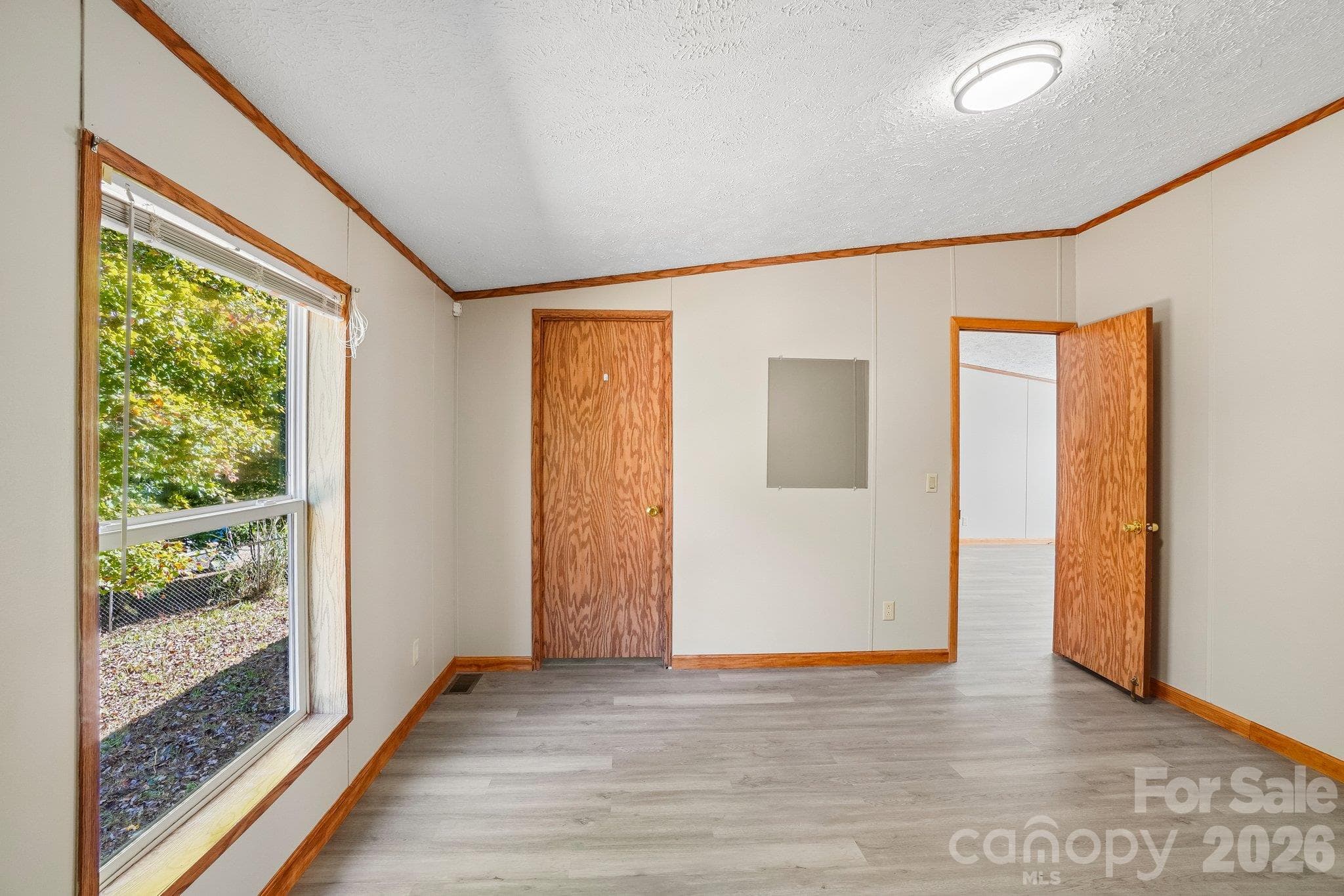 And, the door on the opposite side opens into a - 202 Banyan Road, Candler