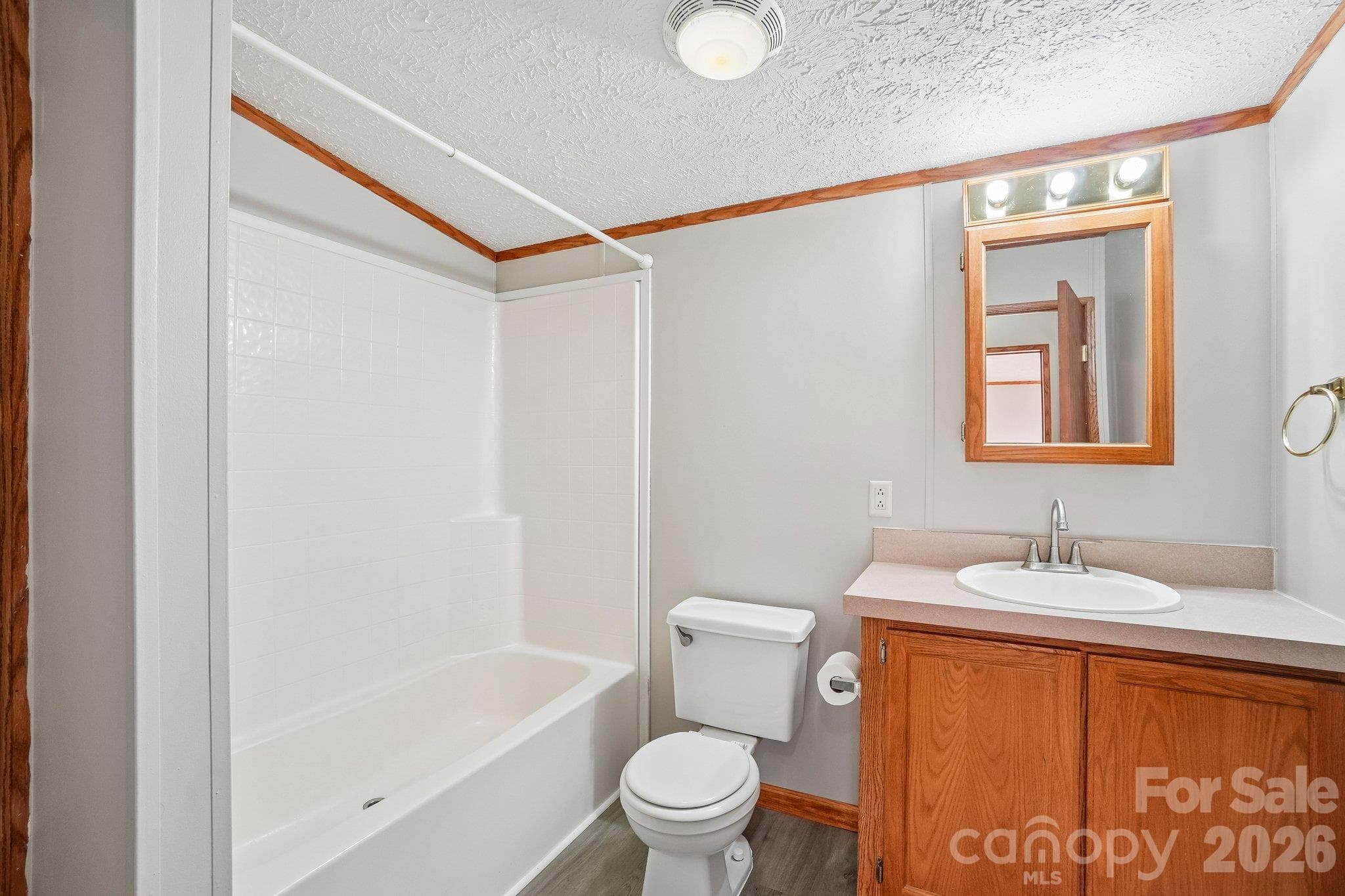 Both bedroom doors lead to the second full bathroom off of the family room. - 202 Banyan Road, Candler