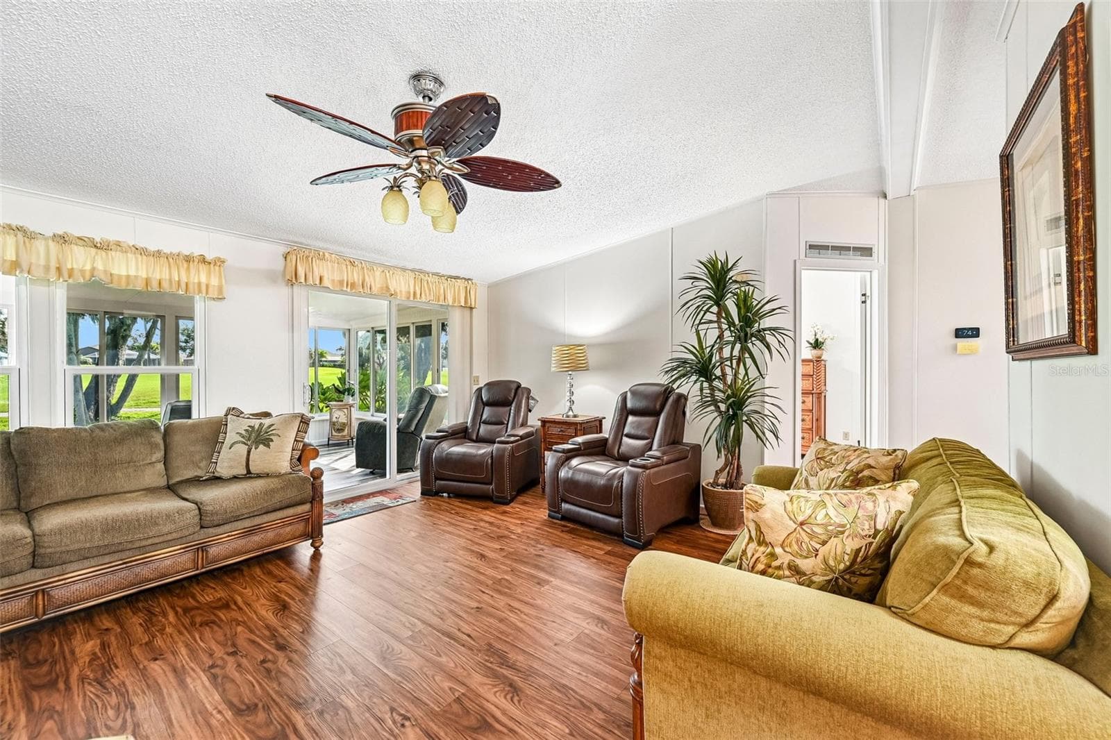 Partial View of Back Lanai and Golf Course from Spacious Living Room - 8510 COUNTESS AVENUE CIR, PALMETTO