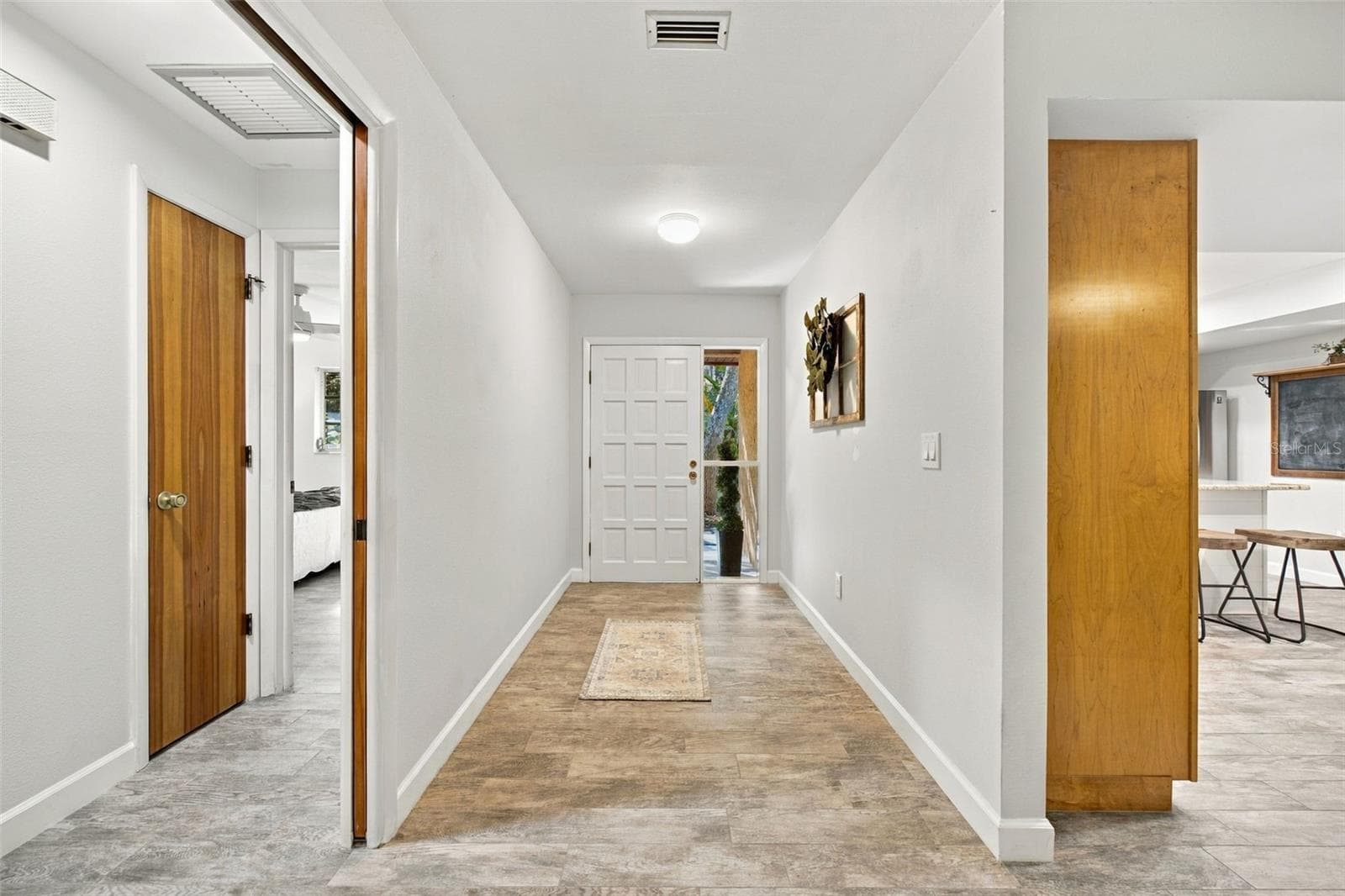 Front Door and hallway to bedroom - 19709 HIAWATHA RD, ODESSA