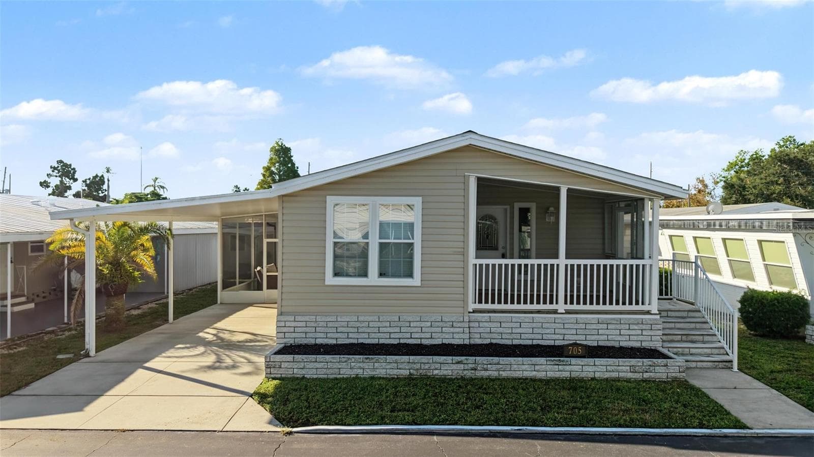 Manufactured Home at 20000 US HIGHWAY 19 N #705, CLEARWATER, photo 2 of 39