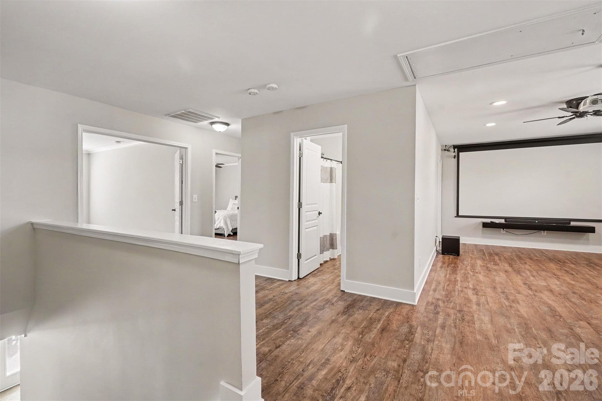 Just off the stairway on the second floor...you notice.. No Carpeting... Theater Room...This Wow Space can be yours! - 3585 Leighton Drive SW, Concord