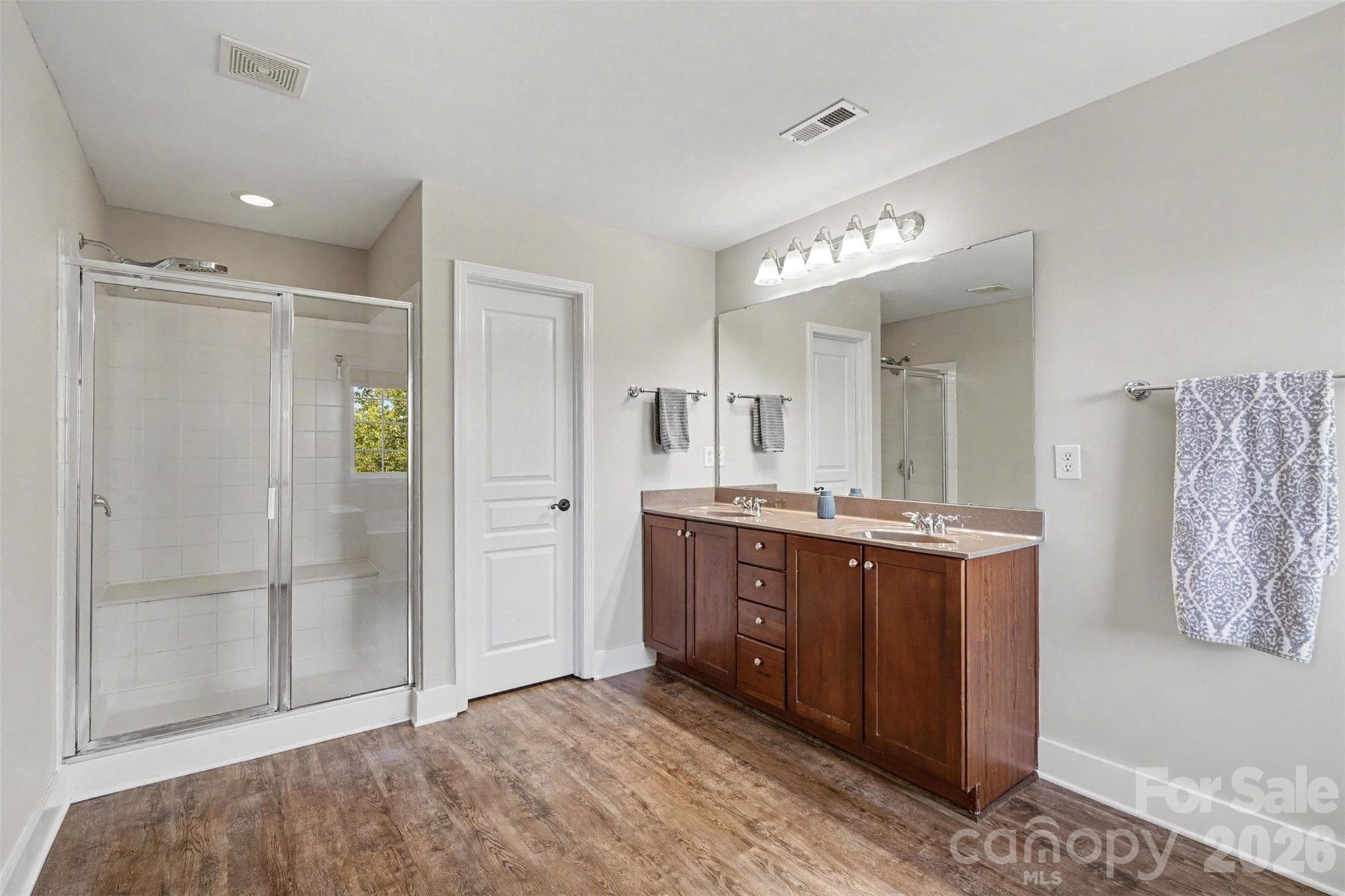 Spacious Walk-in Shower. Private Water Closet and Linen Closet located in the bathroom. Check out all that space! - 3585 Leighton Drive SW, Concord