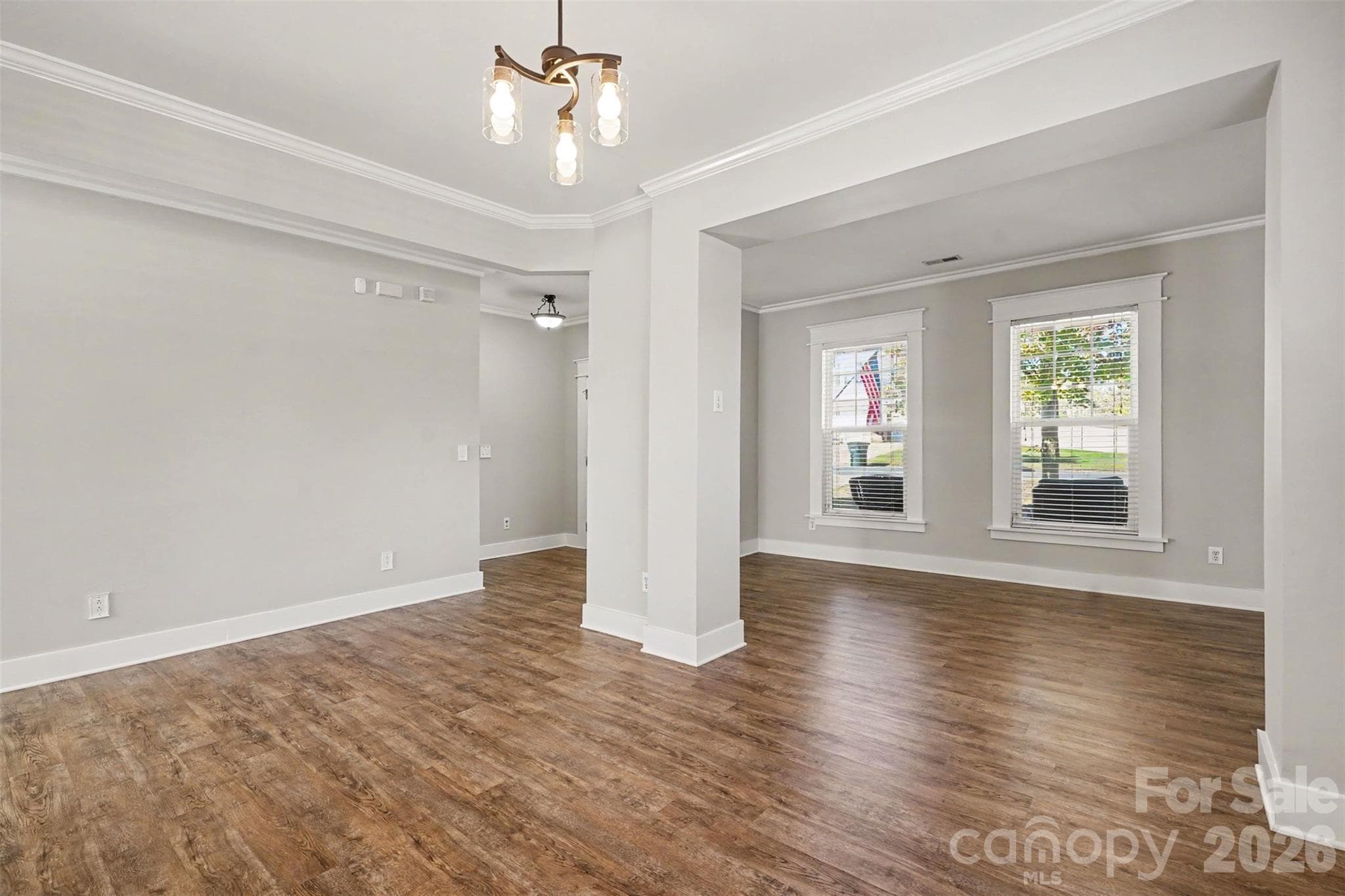 Formal Dining Room has beautiful flooring, fresh- neutral paint. Open Concept Floorplan. - 3585 Leighton Drive SW, Concord