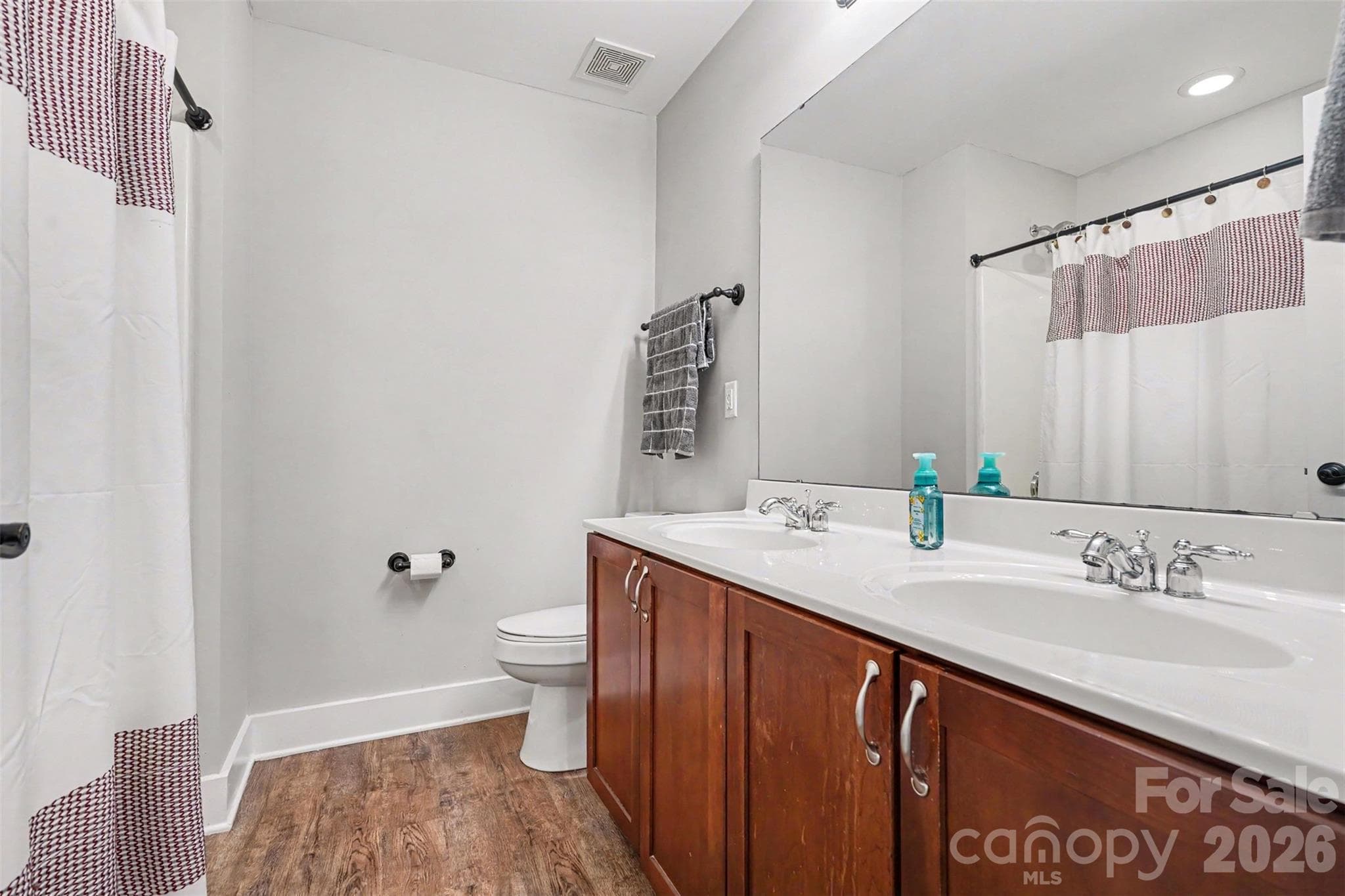 Full Bathroom on the second floor. Features Dual Vanities, lots of storage and tub/shower. Fresh-neutral paint. - 3585 Leighton Drive SW, Concord