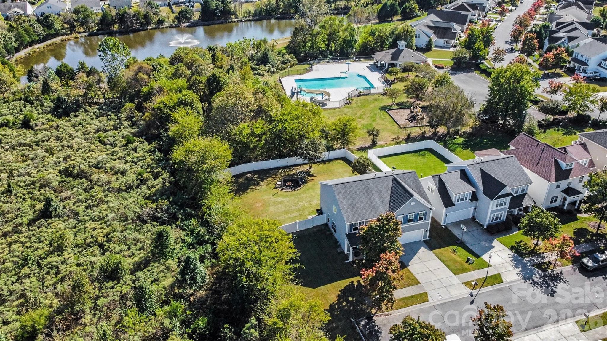 Check This Out. The home is the home on the left... notice the dead end so no through traffic... lots of privacy and CHECK OUT the LOCATION OF THE COMMUNITY POOL. YEP THAT IS RIGHT ... WALK through the backyard and BAM you are at the Community Amenities... Have a Pool "In your backyard" - "Without Having a Pool in Your Backyard". All the Percs... Nothing to Maintain!!! - 3585 Leighton Drive SW, Concord