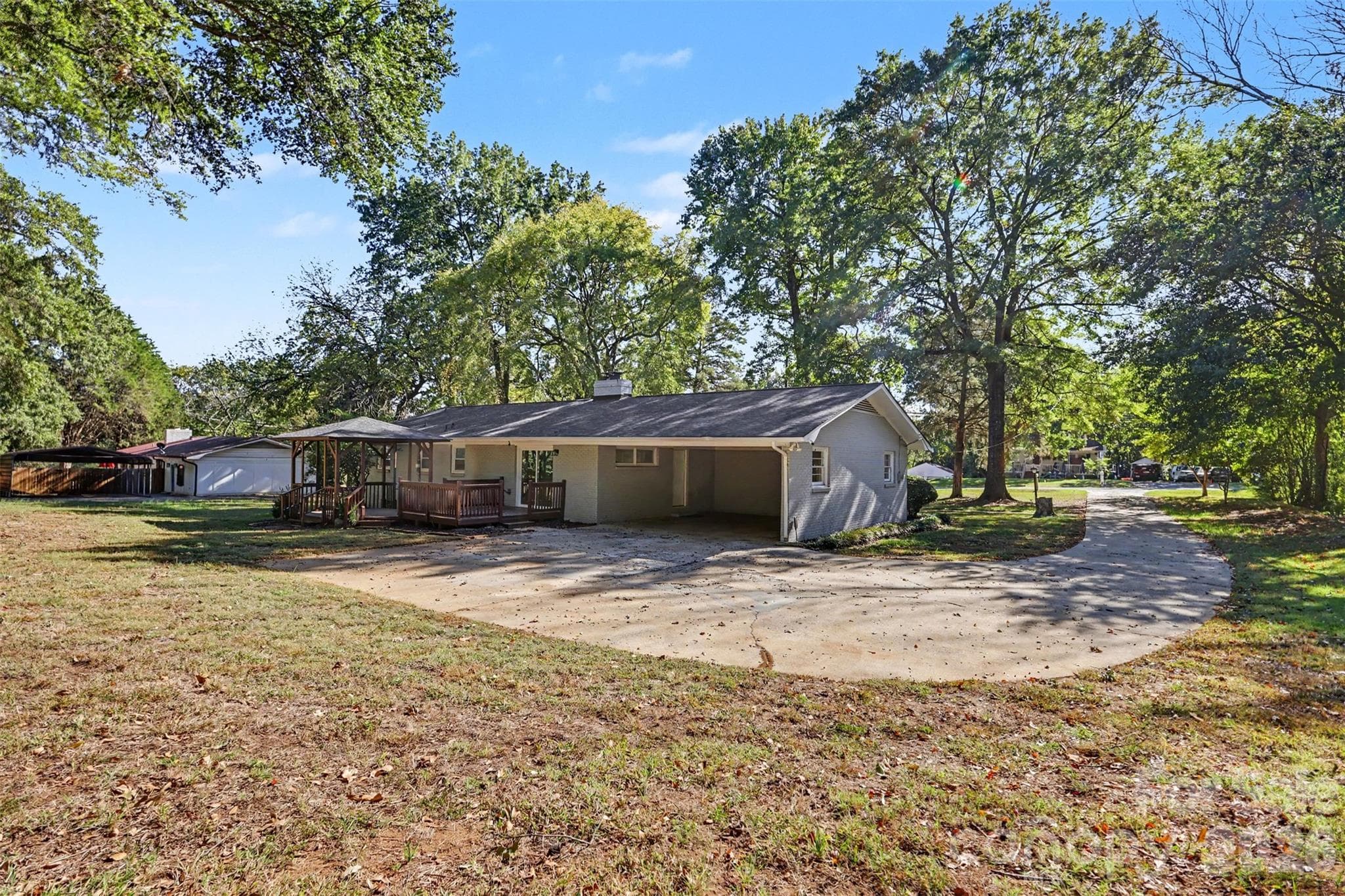 Back of home with 2 car carport - 519 Amon Lane, Pineville