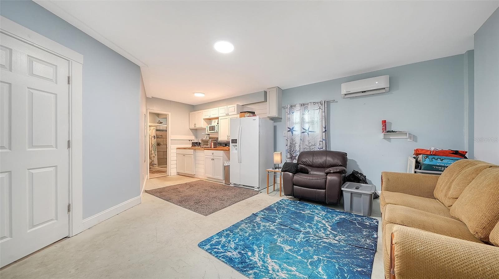 Ground floor under Unit A, efficiency apartment or in-law suite/storage space. - 2514 AVENUE B, BRADENTON BEACH