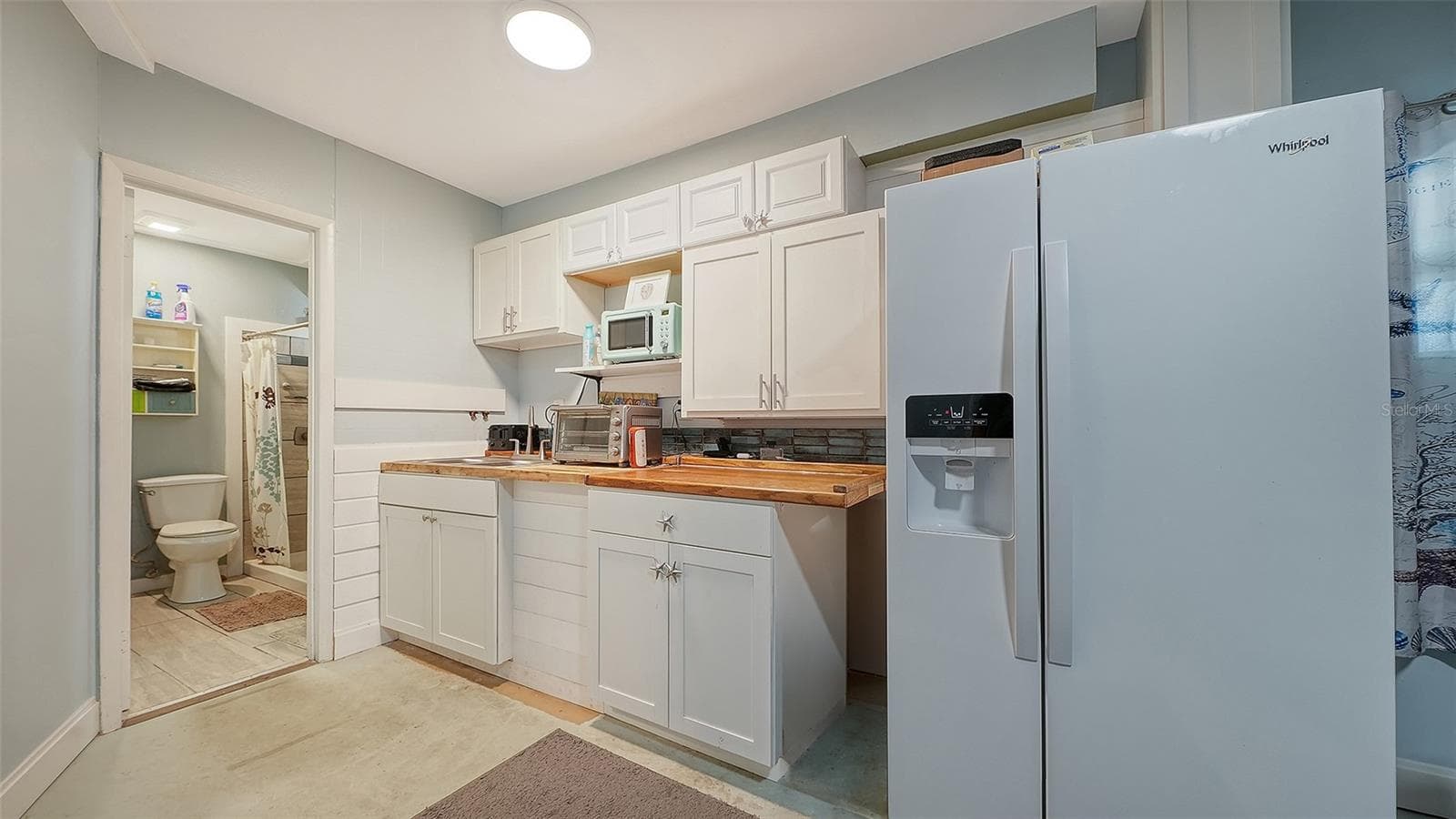 Ground floor under Unit A, efficiency apartment or in-law suite. - 2514 AVENUE B, BRADENTON BEACH