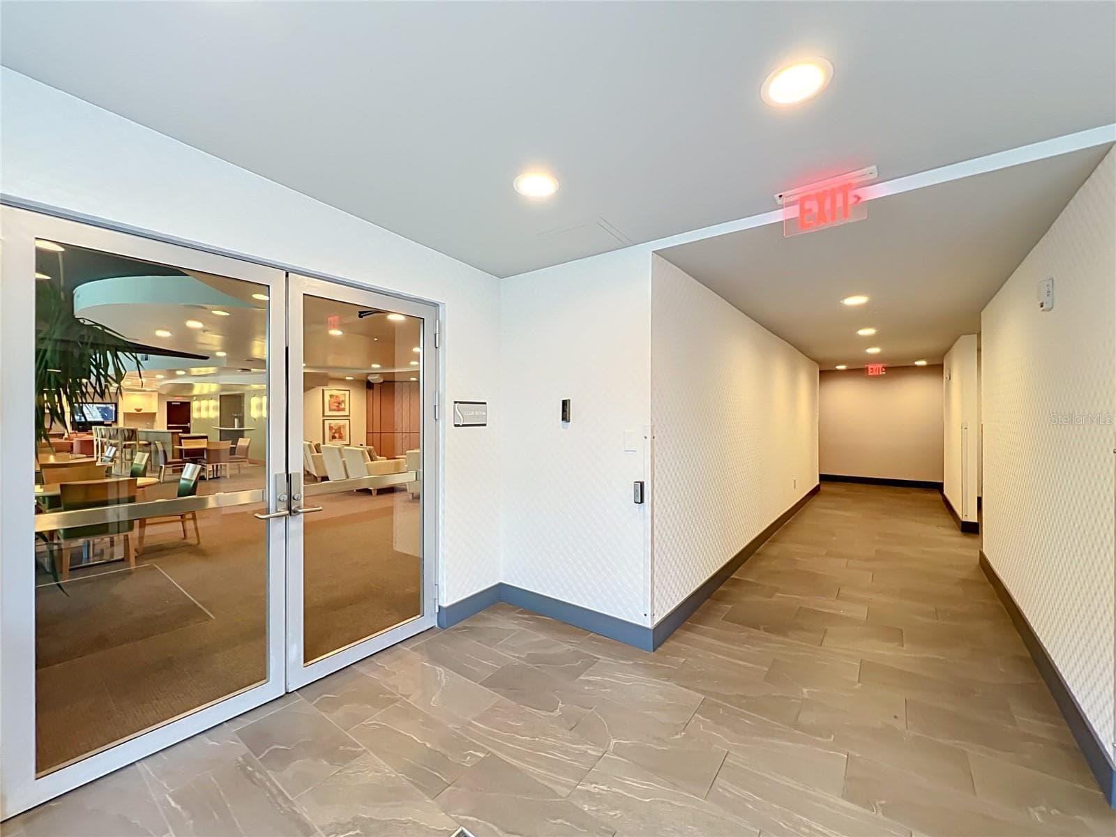 Entrance to lounge/media center. - 155 S COURT AVE #2107, ORLANDO